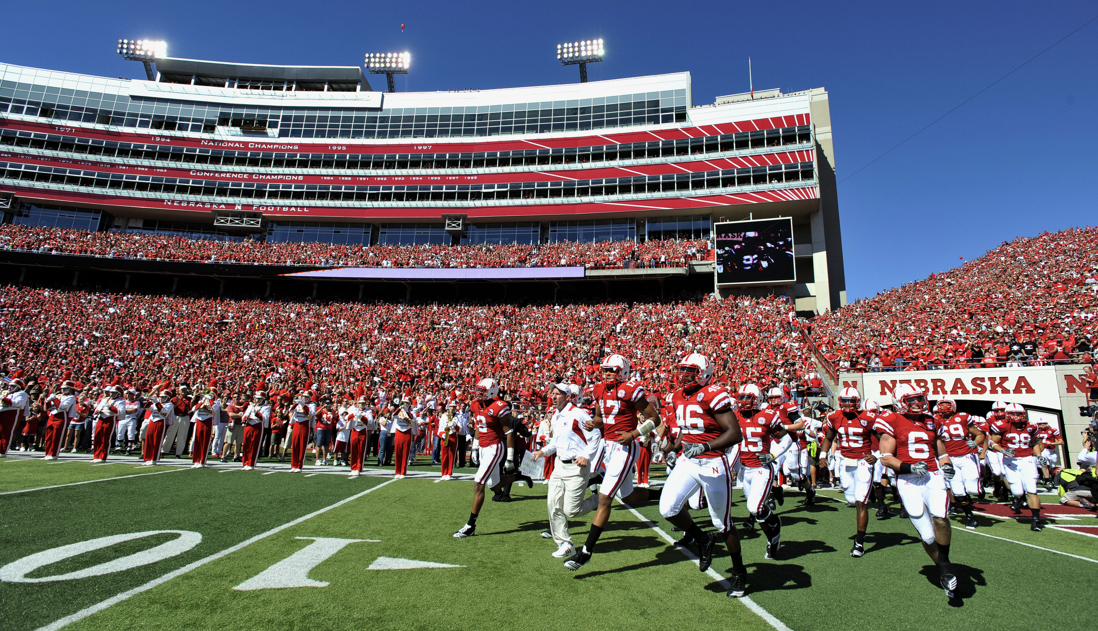 LINCOLN, NE - SEPTEMBER 11: Nebraska Cornhuskers HEad Coach Bo Pelini (center) leads his team onto the field before their game against the Udaho Vandals at Memorial Stadium on September 4, 2010 in Lincoln, Nebraska. Nebraska Defeated Idaho 38-17. (Photo b
