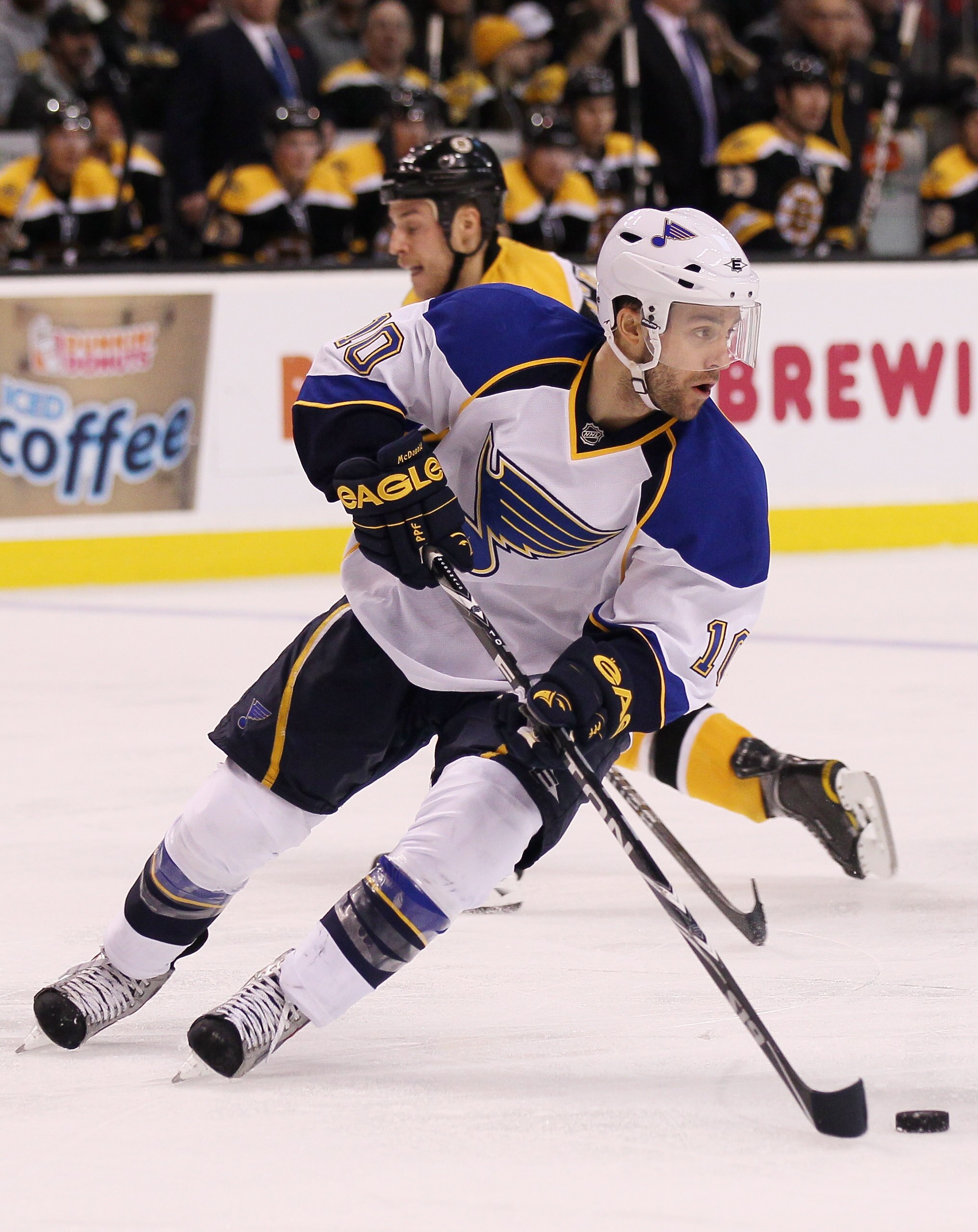 BOSTON - NOVEMBER 06:  Andy McDonald #10 of the St. Louis Blues takes the puck in the second period against the Boston Bruins on November 6, 2010 at the TD Garden in Boston, Massachusetts.  (Photo by Elsa/Getty Images)