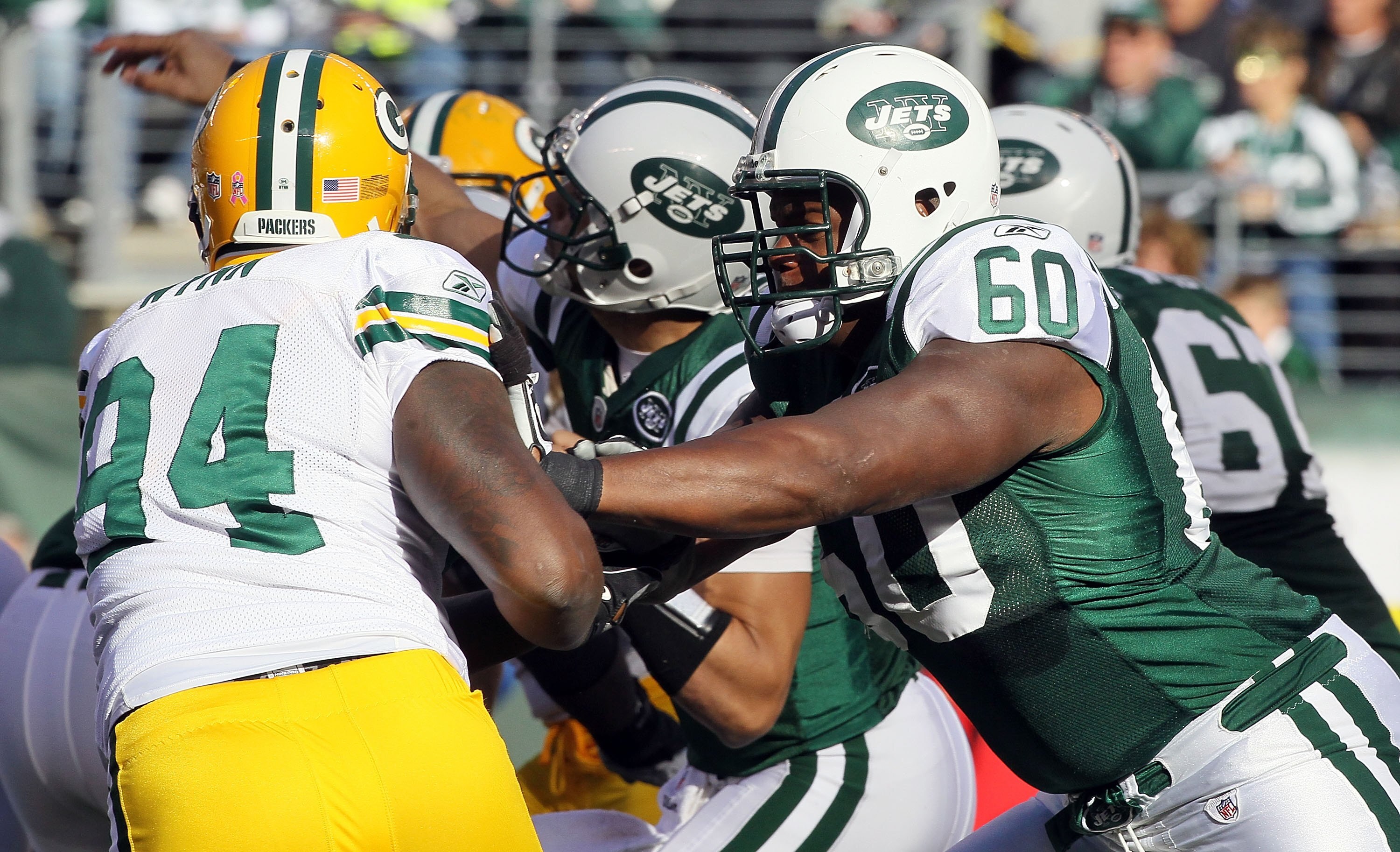 EAST RUTHERFORD, NJ - OCTOBER 31: D'Brickashaw Ferguson #60 of the New York Jets in action against the Green Bay Packers on October 31, 2010 at the New Meadowlands Stadium in East Rutherford, New Jersey. The Packers defeated the Jets 9-0. (Photo by Jim EAST RUTHERFORD, NJ - OCTOBER 31: D'Brickashaw Ferguson #60 of the New York Jets in action against the Green Bay Packers on October 31, 2010 at the New Meadowlands Stadium in East Rutherford, New Jersey. The Packers defeated the Jets 9-0. (Photo by Jim
