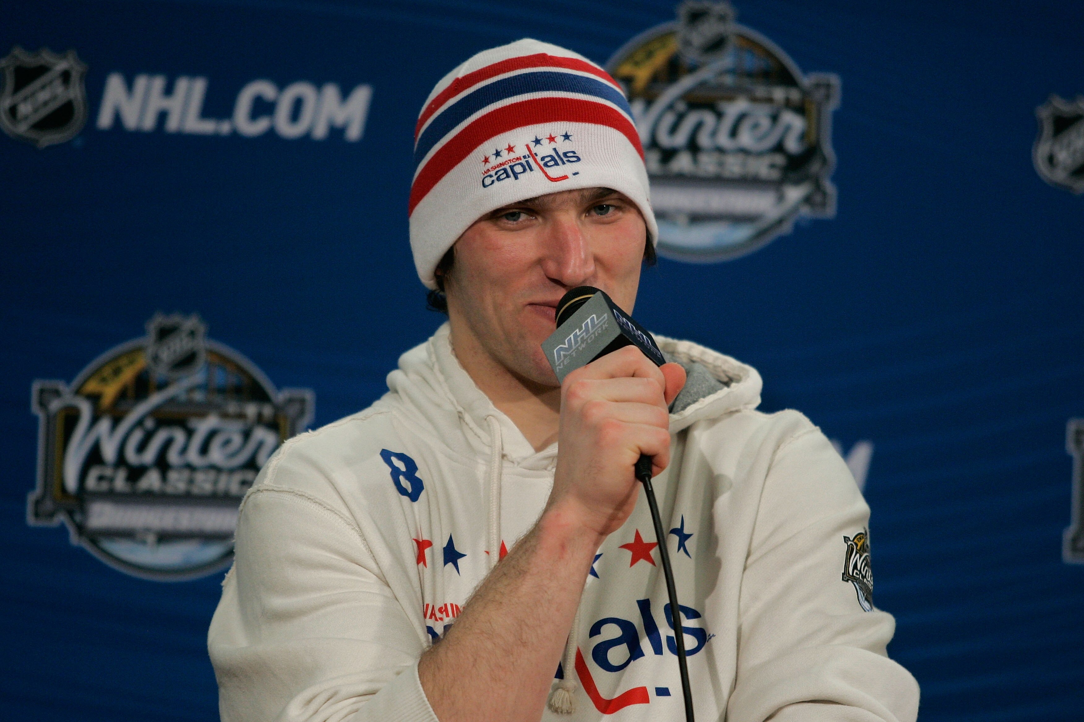 PITTSBURGH, PA - JANUARY 01:  Alex Ovechkin #8 of the Washington Capitals talks to the media during a press conference after defeating the Pittsburgh Penguins 3-1 during the 2011 NHL Bridgestone Winter Classic at Heinz Field on January 1, 2011 in Pittsbur
