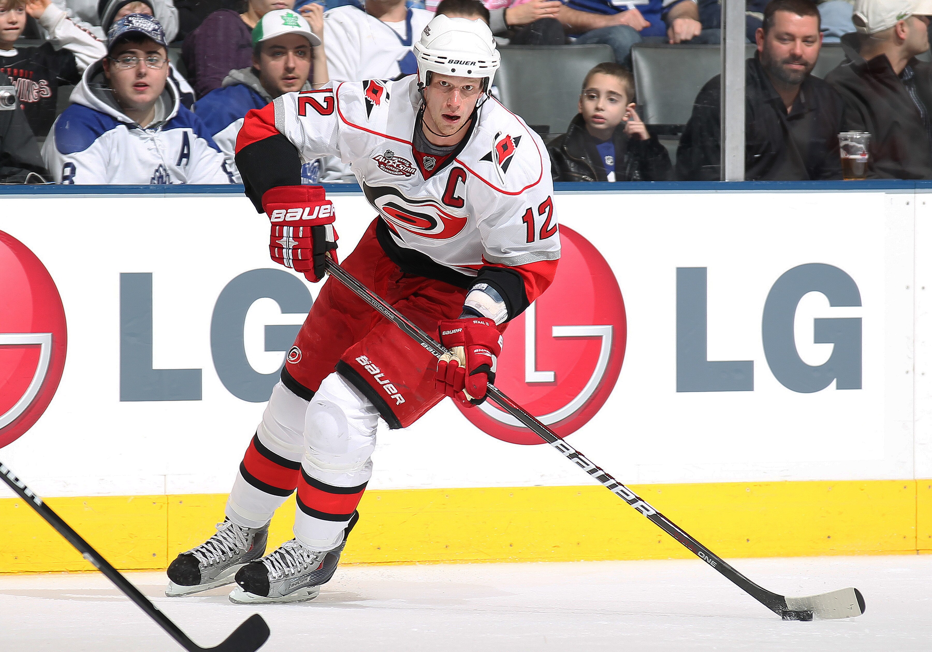 TORONTO, ON - DECEMBER 28:  Eric Staal #12 of the Carolina Hurricanes gets set to take a shot in a game against the Toronto Maple Leafs on December 28, 2010 at the Air Canada Centre in Toronto,Ontario. The Hurricanes defeated the Leafs 4-3. (Photo by Clau