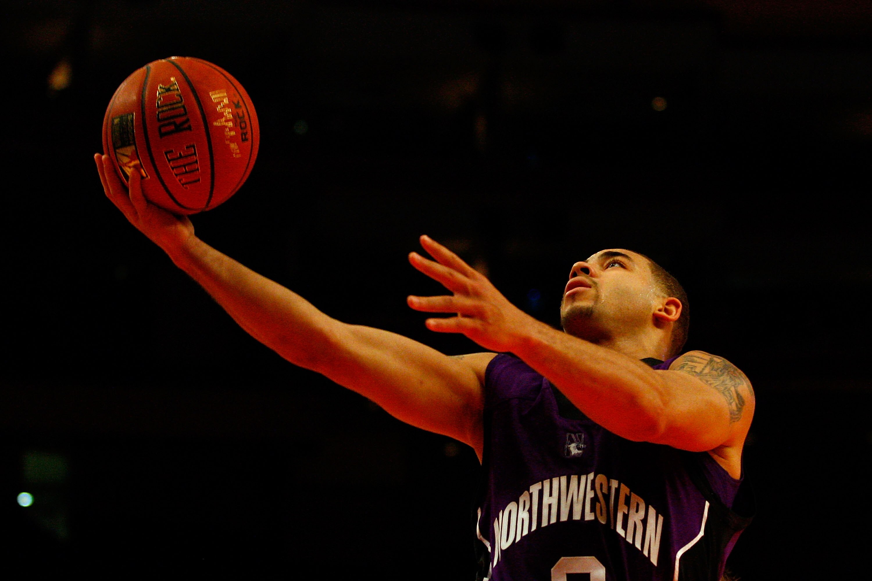 NEW YORK, NY - DECEMBER 20:  Michael Thompson #2 of the Northwestern Wildcats drives for a shot attempt against the St. Francis Terriers during the Madison Square Garden Holiday Festival at Madison Square Garden on December 20, 2010 in New York City.  (Ph