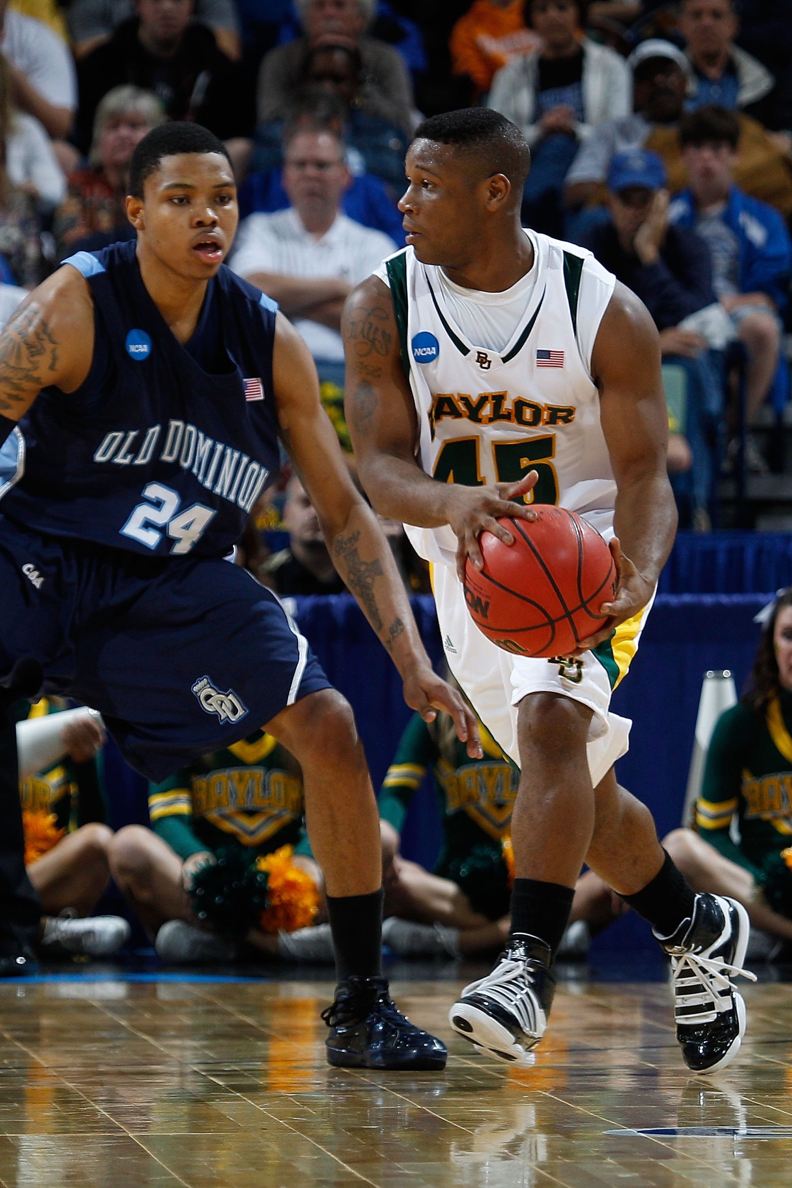 NEW ORLEANS - MARCH 20: Tweety Carter #45 of the Baylor Bears passes the ball around Kent Bazemore #24 of the Old Dominion University Monarchs during the second round of the 2010 NCAA men's basketball tournament at the New Orleans Arena on March 20, 2010 NEW ORLEANS - MARCH 20: Tweety Carter #45 of the Baylor Bears passes the ball around Kent Bazemore #24 of the Old Dominion University Monarchs during the second round of the 2010 NCAA men's basketball tournament at the New Orleans Arena on March 20, 2010