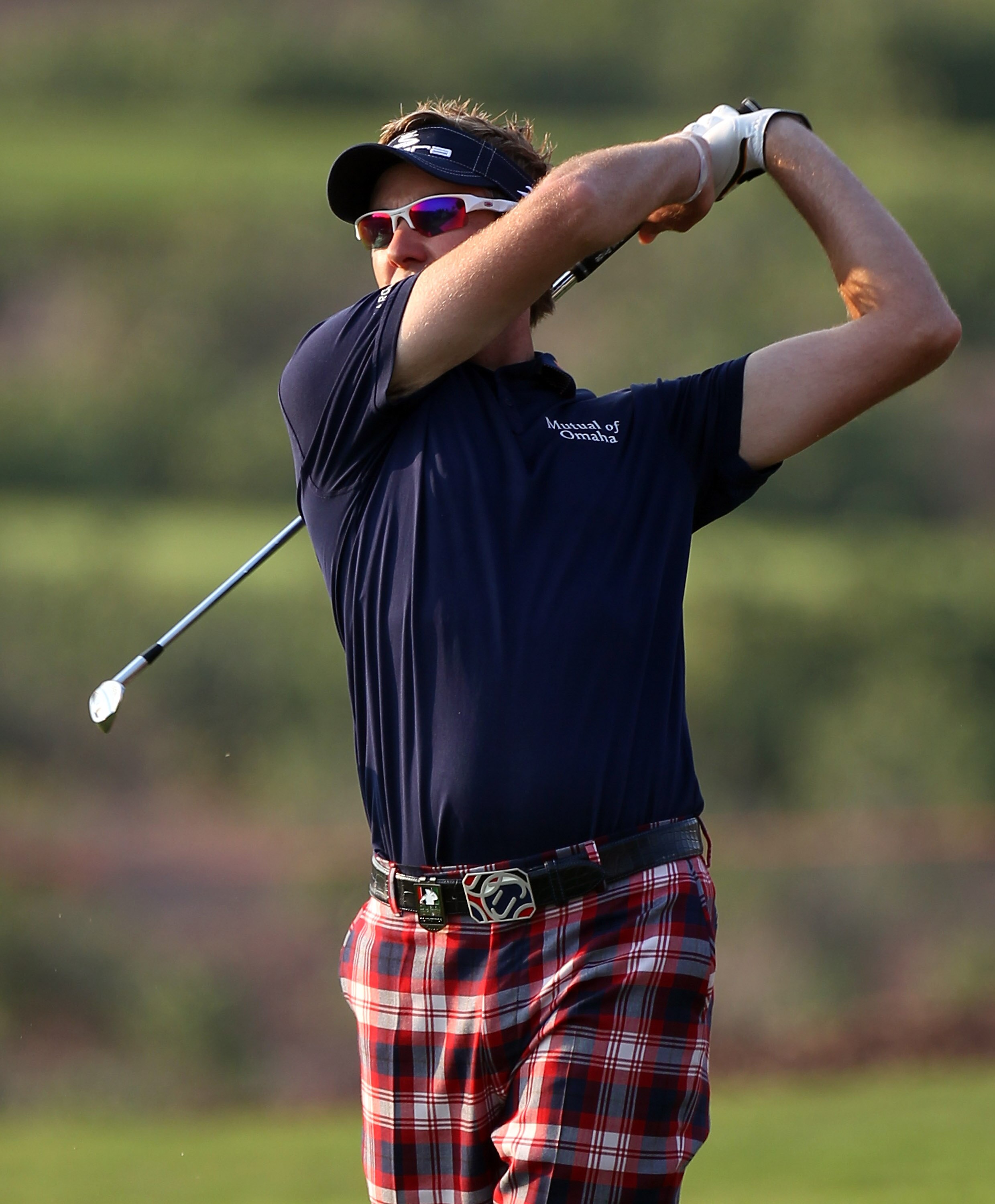DUBAI, UNITED ARAB EMIRATES - NOVEMBER 27:  Ian Poulter of England during the third round of the Dubai World Championship on the Earth Course, Jumeirah Golf Estates on November 27, 2010 in Dubai, United Arab Emirates.  (Photo by Ross Kinnaird/Getty Images