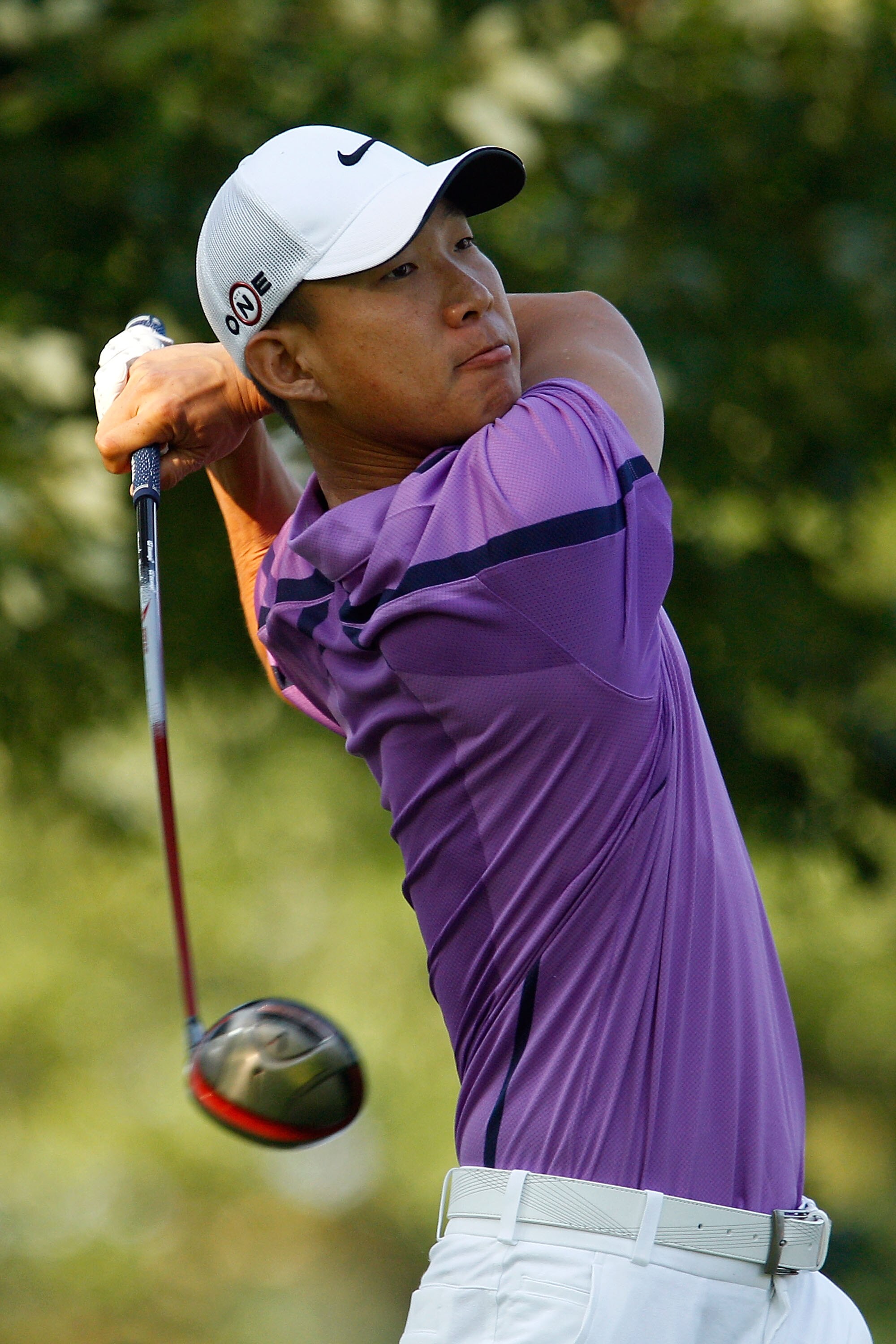 PARAMUS, NJ - AUGUST 26:  Anthony Kim watches his tee shot on the 11th hole during the first round of The Barclays at the Ridgewood Country Club on August 26, 2010 in Paramus, New Jersey.  (Photo by Scott Halleran/Getty Images)