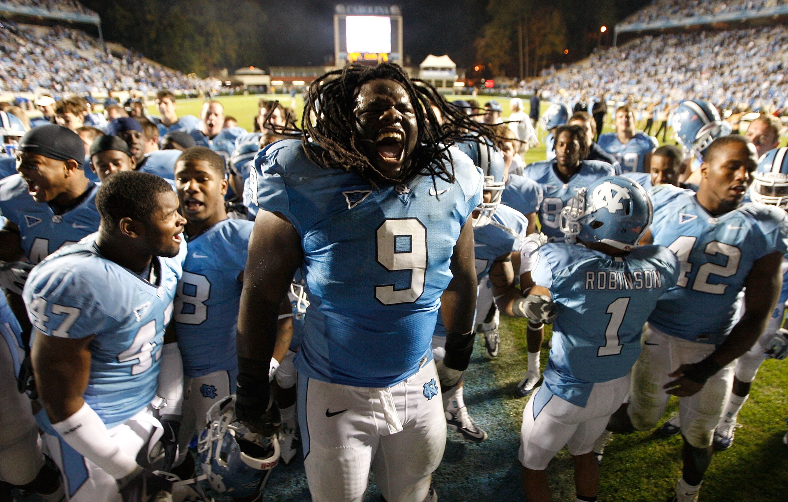 CHAPEL HILL, NC - NOVEMBER 07: Marvin Austin #9 of the North Carolina Tar Heels celebrates with teammates after a 19-6 victory over the Duke Blue Devils during their game at Kenan Stadium on November 7, 2009 in Chapel Hill, North Carolina. (Photo by Str CHAPEL HILL, NC - NOVEMBER 07: Marvin Austin #9 of the North Carolina Tar Heels celebrates with teammates after a 19-6 victory over the Duke Blue Devils during their game at Kenan Stadium on November 7, 2009 in Chapel Hill, North Carolina. (Photo by Str