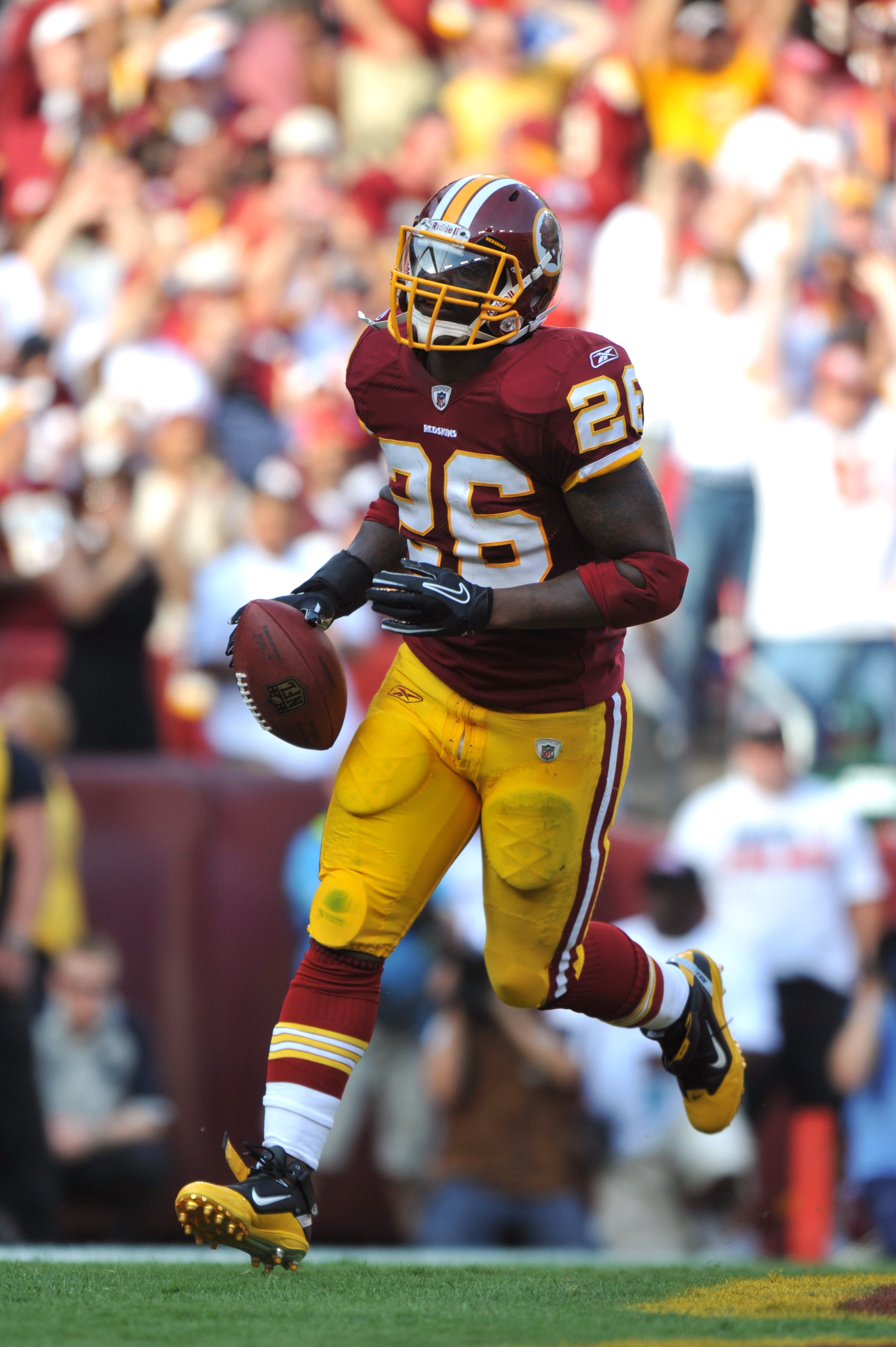 LANDOVER, MD - SEPTEMBER 19:  Clinton Portis #26 of the Washington Redskins celebrates a touchdown during the game against the Houston Texans at FedExField on September 19, 2010 in Landover, Maryland. The Texans defeated the Redskins in overtime 30-27. (P
