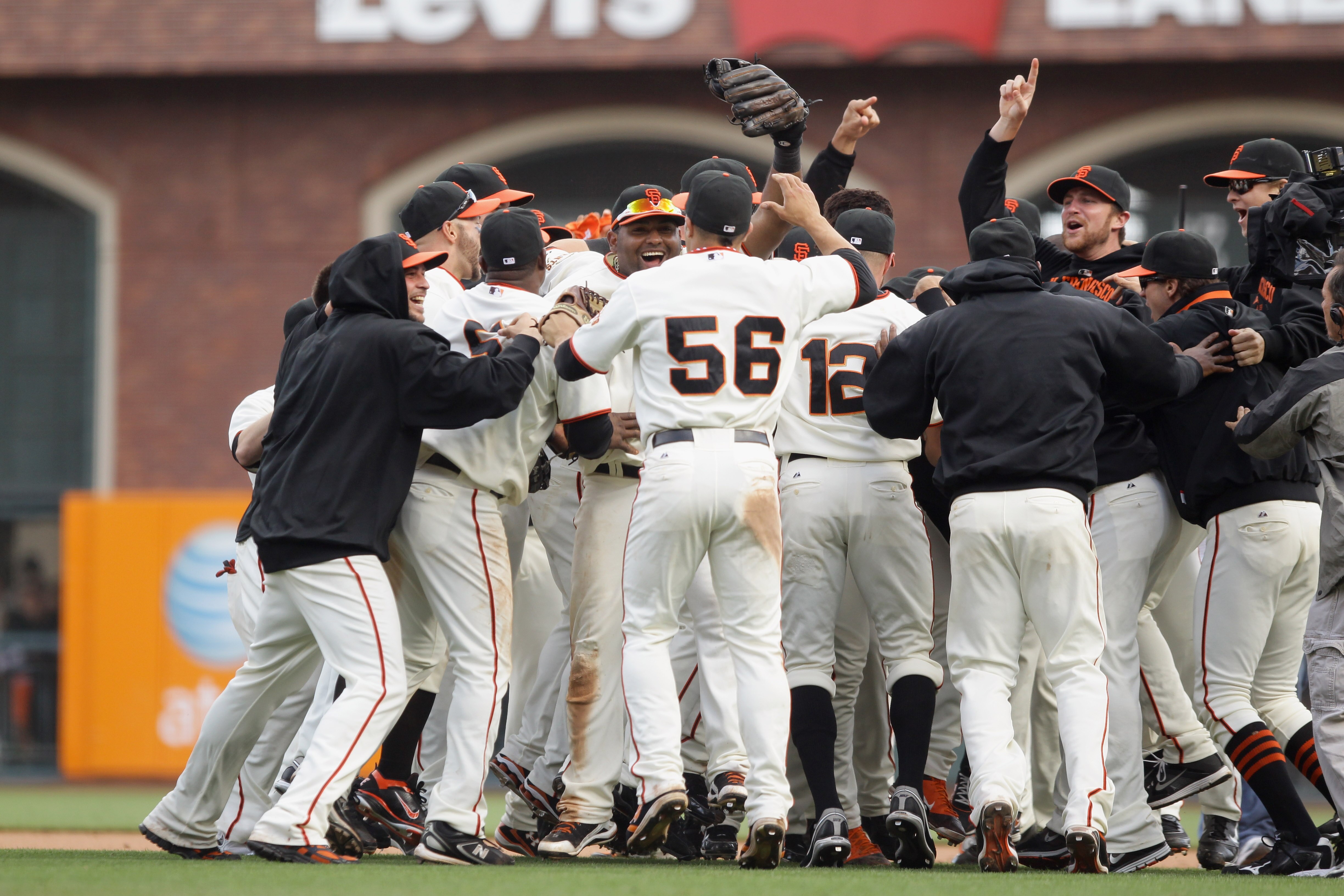 SAN FRANCISCO - OCTOBER 03:  The San Francisco Giants celebrate after they beat the San Diego Padres to win the National League West Title at AT&T Park on October 3, 2010 in San Francisco, California.  (Photo by Ezra Shaw/Getty Images)