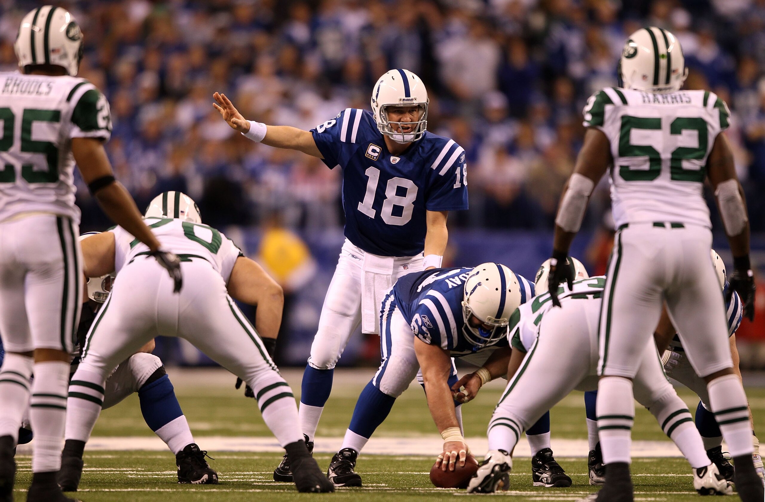 INDIANAPOLIS - JANUARY 24:  Quarterback Peyton Manning #18 of the Indianapolis Colts under center during the second half against the New York Jets during the AFC Championship Game at Lucas Oil Stadium on January 24, 2010 in Indianapolis, Indiana. The Colt
