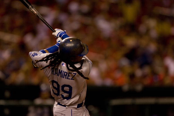 ST. LOUIS - JULY 15: Manny Ramierez #99 of the Los Angeles Dodgers strikes out against the St. Louis Cardinals at Busch Stadium on July 15, 2010 in St. Louis, Missouri.  (Photo by Dilip Vishwanat/Getty Images)