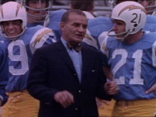 Sid Giman, with John Hadl and the great Lance Alworth partially obscured to his right.
