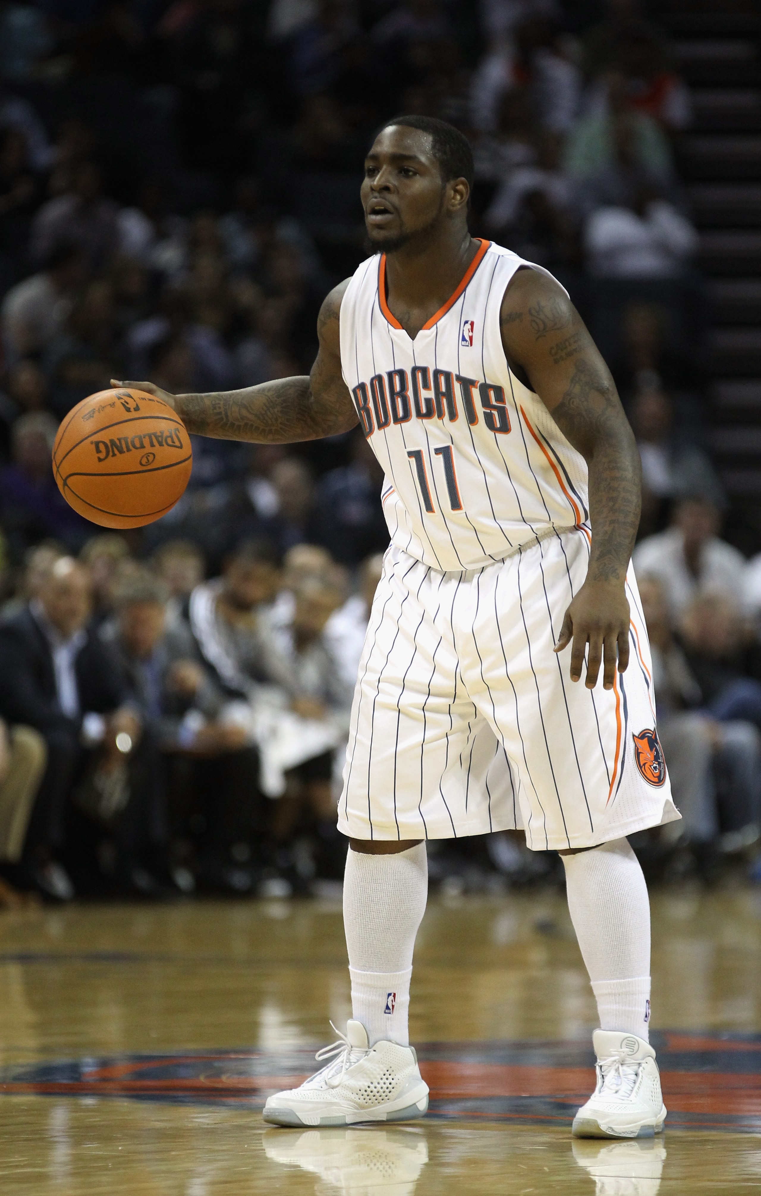CHARLOTTE, NC - NOVEMBER 08: Sherron Collins #11 of the Charlotte Bobcats against the San Antonio Spurs during their game at Time Warner Cable Arena on November 8, 2010 in Charlotte, North Carolina. NOTE TO USER: User expressly acknowledges and agrees t CHARLOTTE, NC - NOVEMBER 08: Sherron Collins #11 of the Charlotte Bobcats against the San Antonio Spurs during their game at Time Warner Cable Arena on November 8, 2010 in Charlotte, North Carolina. NOTE TO USER: User expressly acknowledges and agrees t