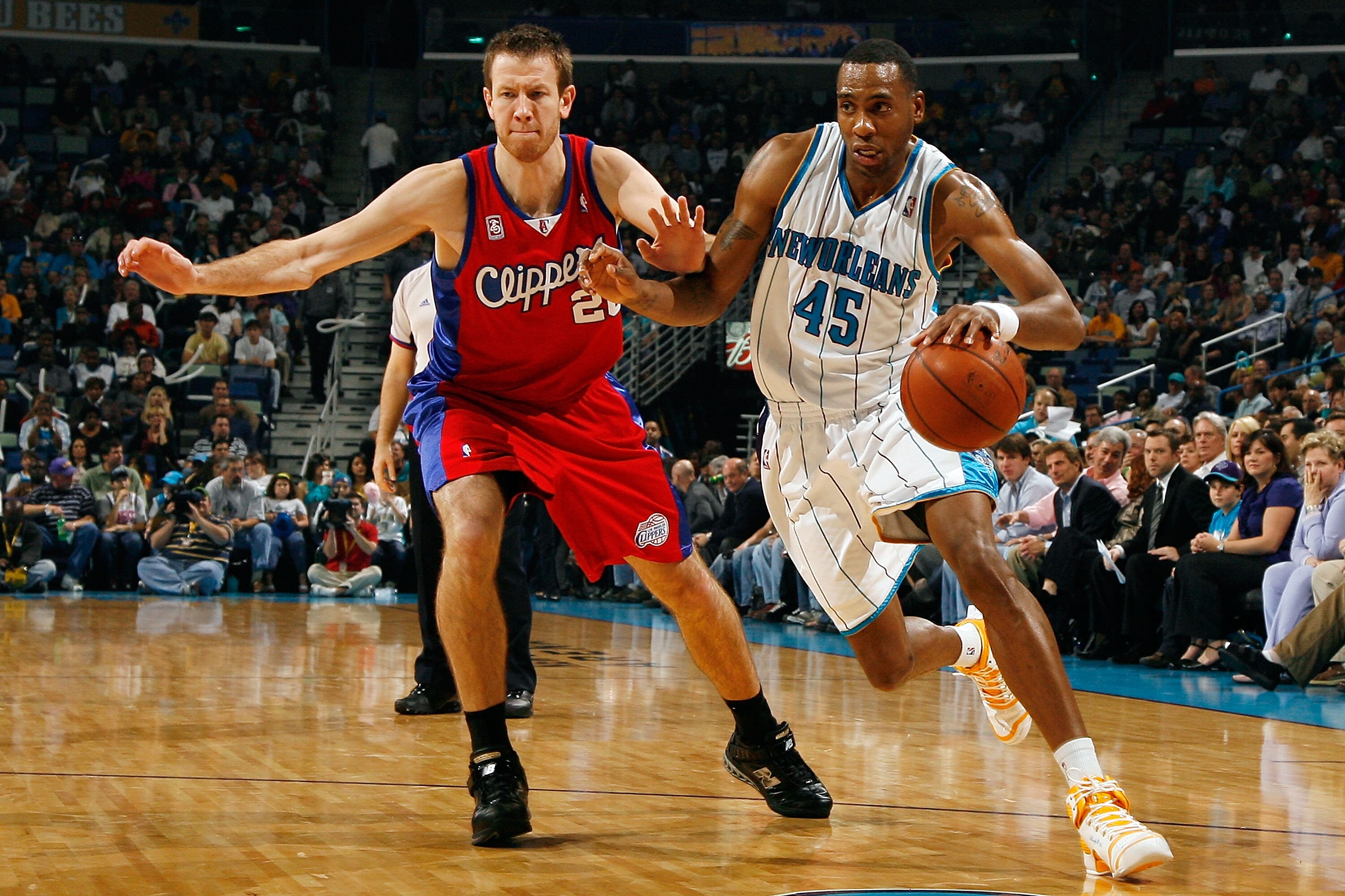 NEW ORLEANS - JANUARY 09:  Rasual Butler #45 of the New Orleans Hornets drives the ball around Steve Novak #20 of the Los Angeles Clippers on January 9, 2009 at the New Orleans Arena in New Orleans, Louisiana.  NOTE TO USER: User expressly acknowledges an