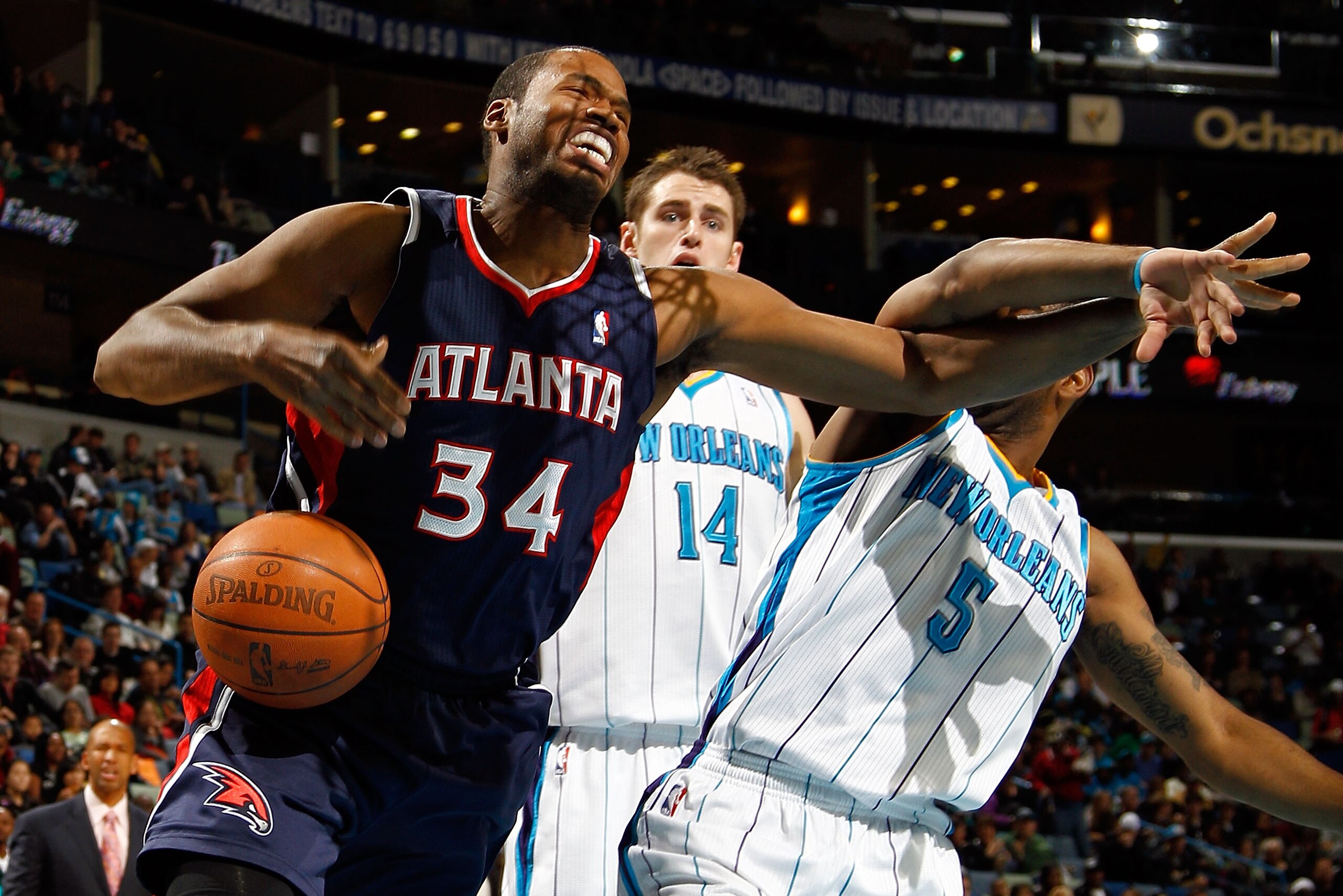 NEW ORLEANS, LA - DECEMBER 26: Jason Collins #34 of the Atlanta Hawks fights for a rebound with Marcus Thornton #5 of the New Orleans Hornets at the New Orleans Arena on December 26, 2010 in New Orleans, Louisiana. The Hornets defeated the Hawks 93-86. NEW ORLEANS, LA - DECEMBER 26: Jason Collins #34 of the Atlanta Hawks fights for a rebound with Marcus Thornton #5 of the New Orleans Hornets at the New Orleans Arena on December 26, 2010 in New Orleans, Louisiana. The Hornets defeated the Hawks 93-86.