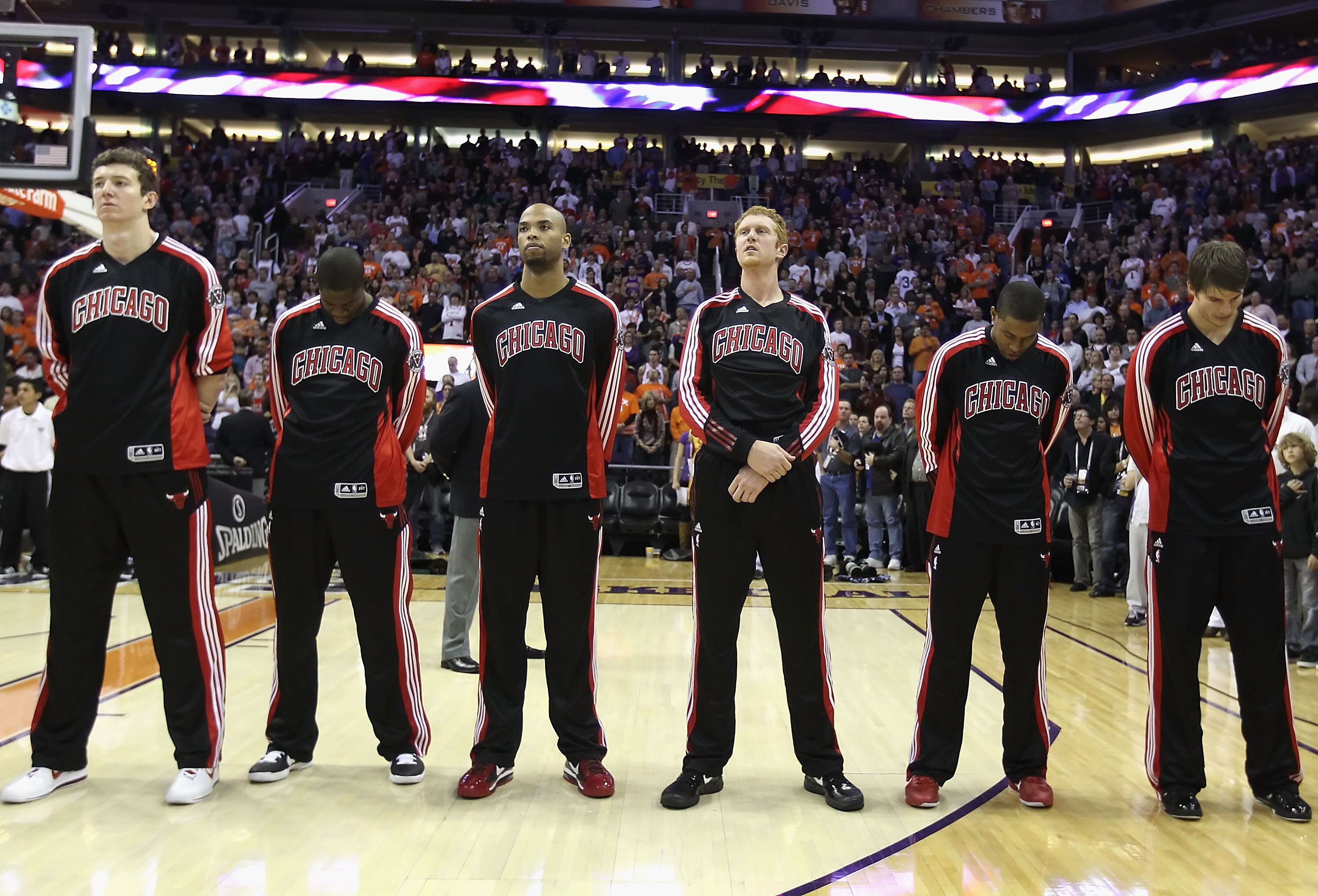 PHOENIX - NOVEMBER 24:  The Chicago Bulls stand attended for the National Anthem before the NBA game against the Phoenix Suns at US Airways Center on November 24, 2010 in Phoenix, Arizona. The Bulls defeated the Suns 123-115 in double overtime.  NOTE TO U