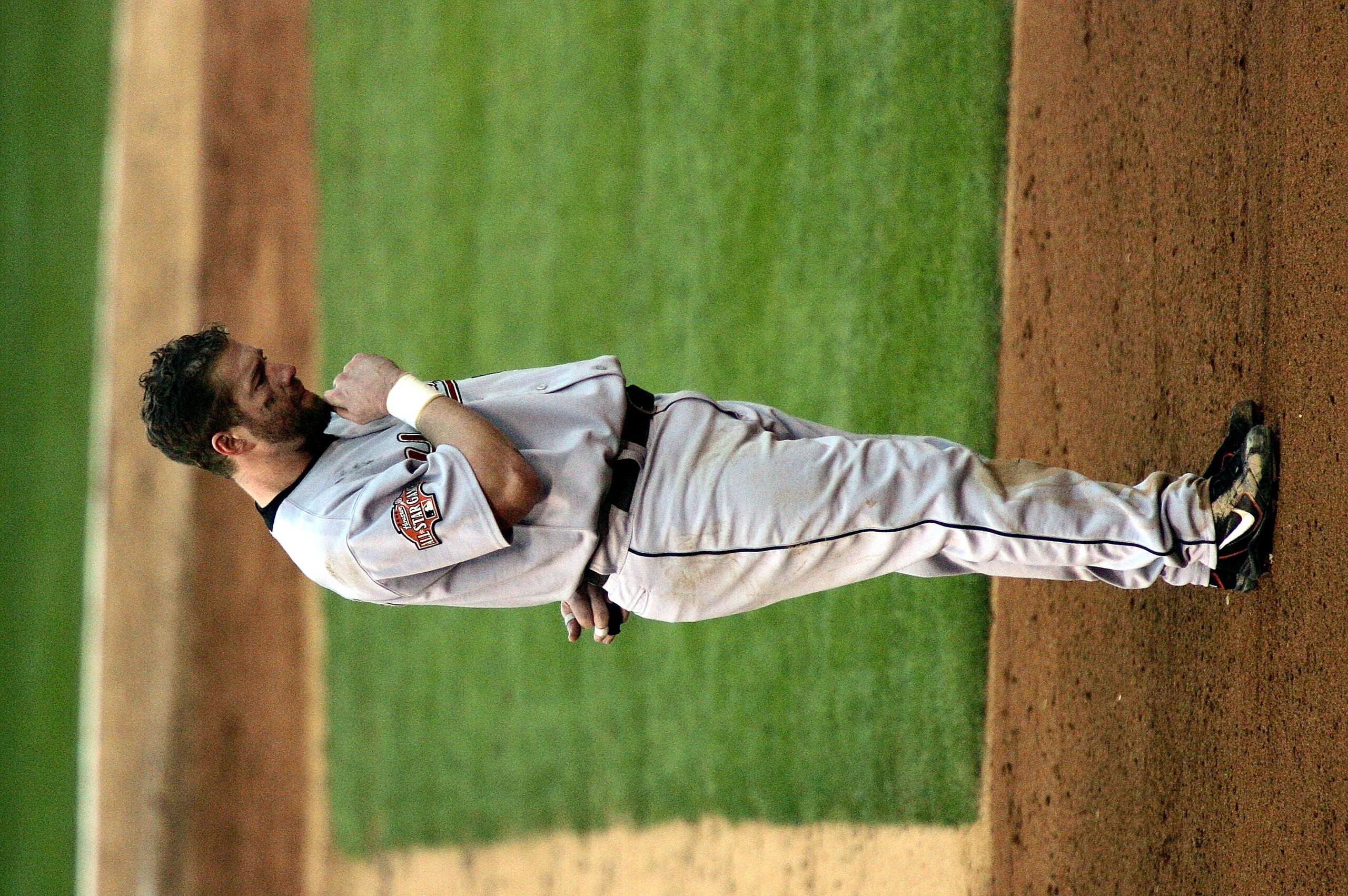 ST LOUIS - OCTOBER 20:  Jeff Bagwell #5 of the Houston Astros stands during the singing of 'God Bless America' in Game 6 of the National League Championship Series against the St. Louis Cardinals October 20, 2004 at Busch Stadium in St. Louis, Missouri.