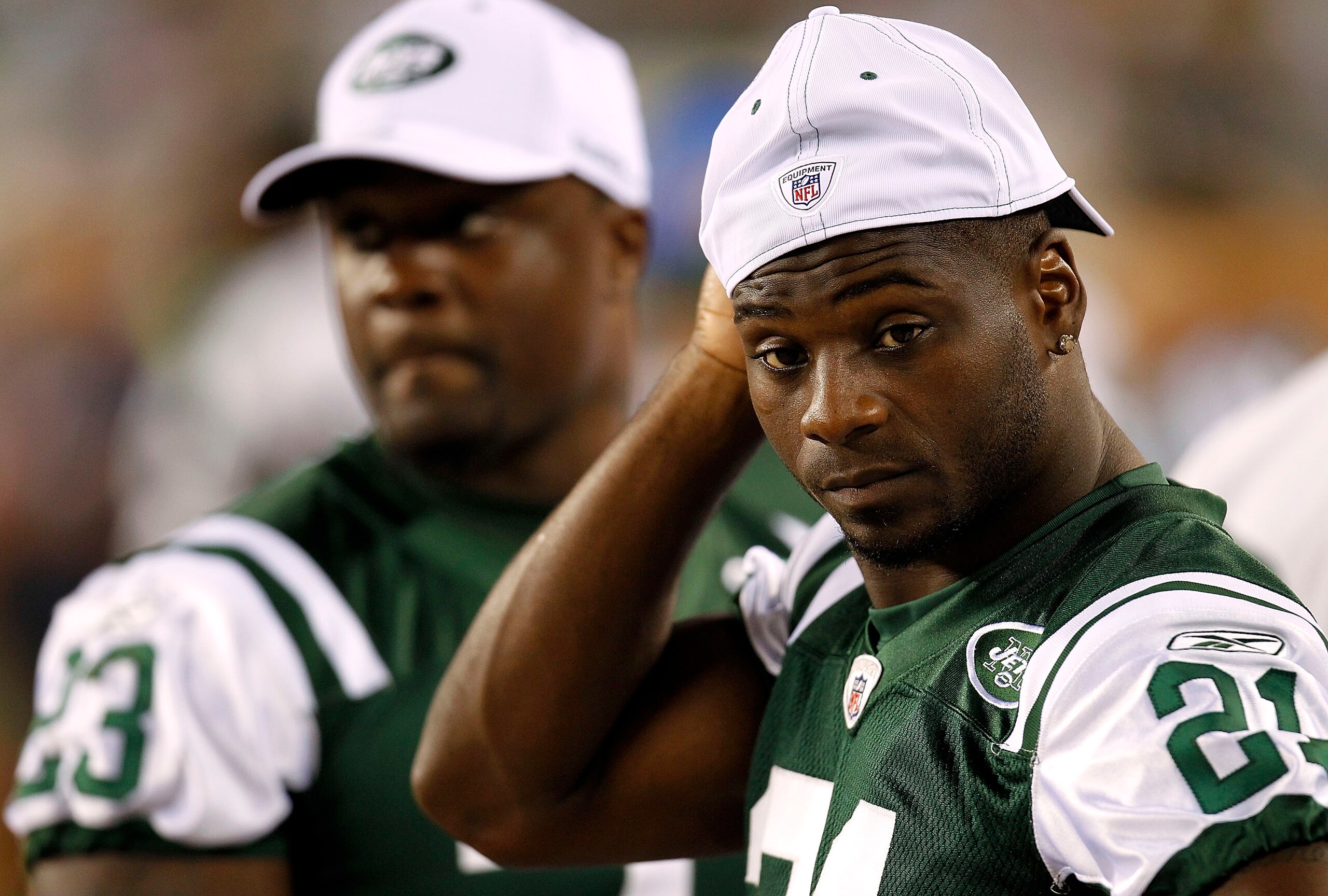 PHILADELPHIA - SEPTEMBER 02:  LaDainian Tomlinson #21 and Shonn Greene #23 of the New York Jets sit on the bench during a preseason game against the Philadelphia Eagles at Lincoln Financial Field on September 2, 2010 in Philadelphia, Pennsylvania.  (Photo