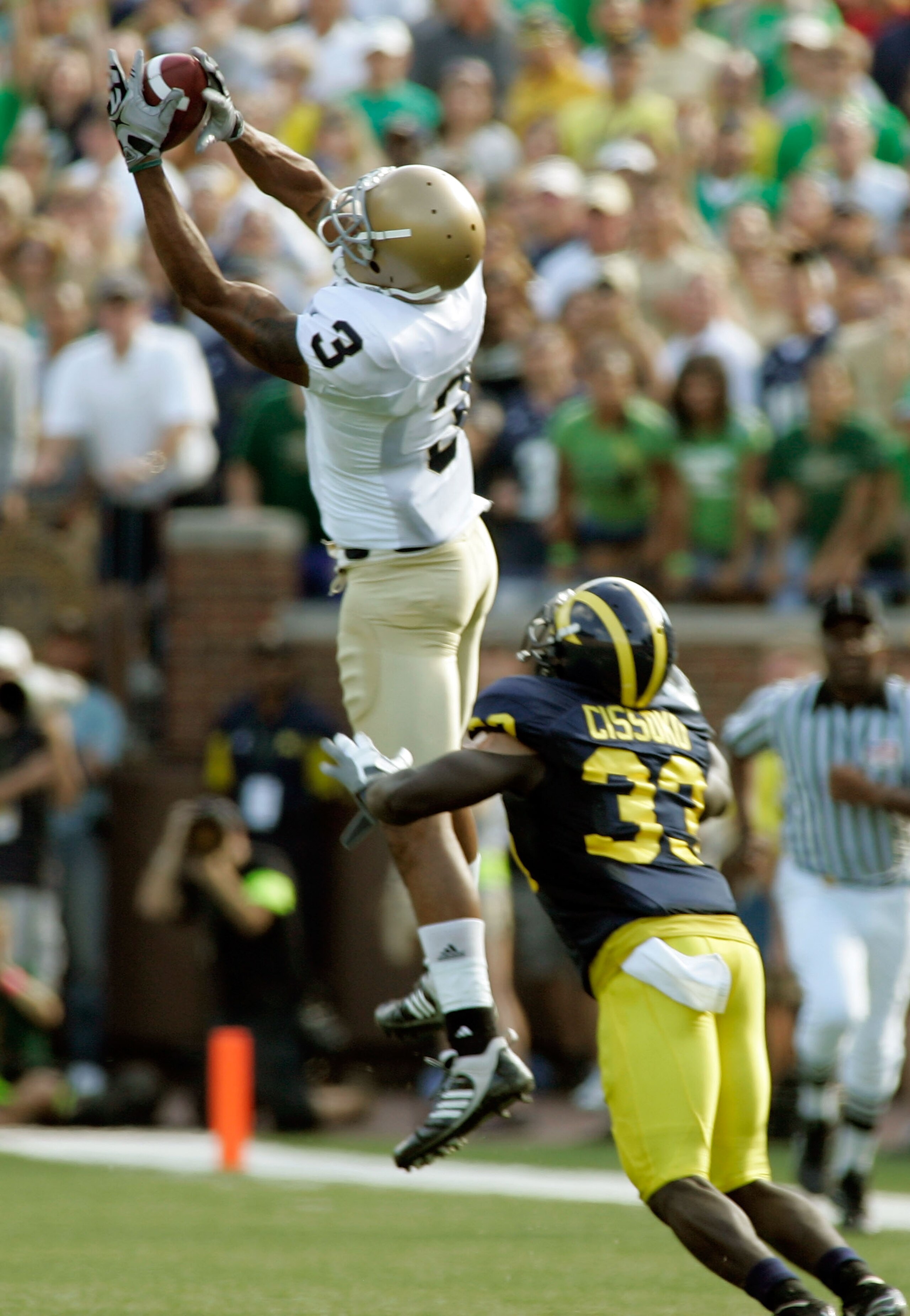 ANN ARBOR, MI - SEPTEMBER 12: Wide reciever Michael Floyd #3 of Notre Dame catches a pass early in the second half against Michigan at Michigan Stadium on September 12, 2009 in Ann Arbor, Michigan. (Photo by Domenic Centofanti/Getty Images) ANN ARBOR, MI - SEPTEMBER 12: Wide reciever Michael Floyd #3 of Notre Dame catches a pass early in the second half against Michigan at Michigan Stadium on September 12, 2009 in Ann Arbor, Michigan. (Photo by Domenic Centofanti/Getty Images)