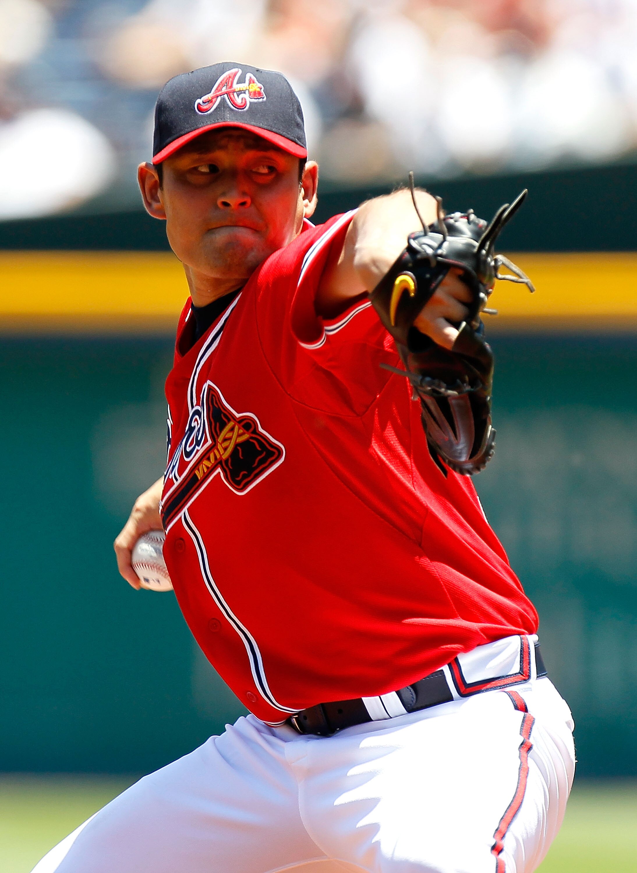ATLANTA - JUNE 20:  Starting pitcher Kenshin Kawakami #11 of the Atlanta Braves pitches against the Kansas City Royals at Turner Field on June 20, 2010 in Atlanta, Georgia.  (Photo by Kevin C. Cox/Getty Images)