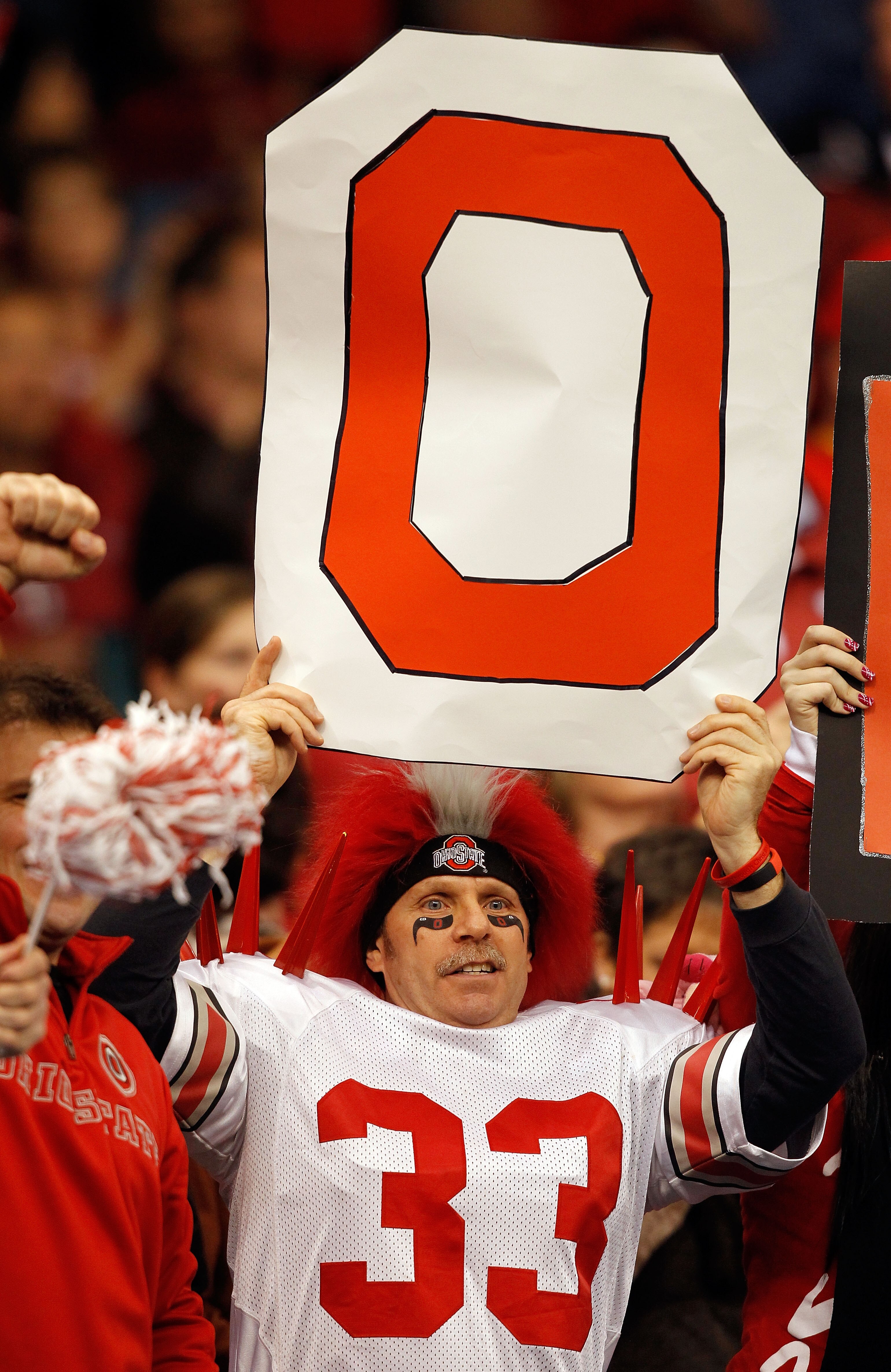 NEW ORLEANS, LA - JANUARY 04:  An Ohio State Buckeyes holds up a sign as the Buckeyes take on the Arkansas Razorbacks during the Allstate Sugar Bowl at the Louisiana Superdome on January 4, 2011 in New Orleans, Louisiana.  (Photo by Matthew Stockman/Getty