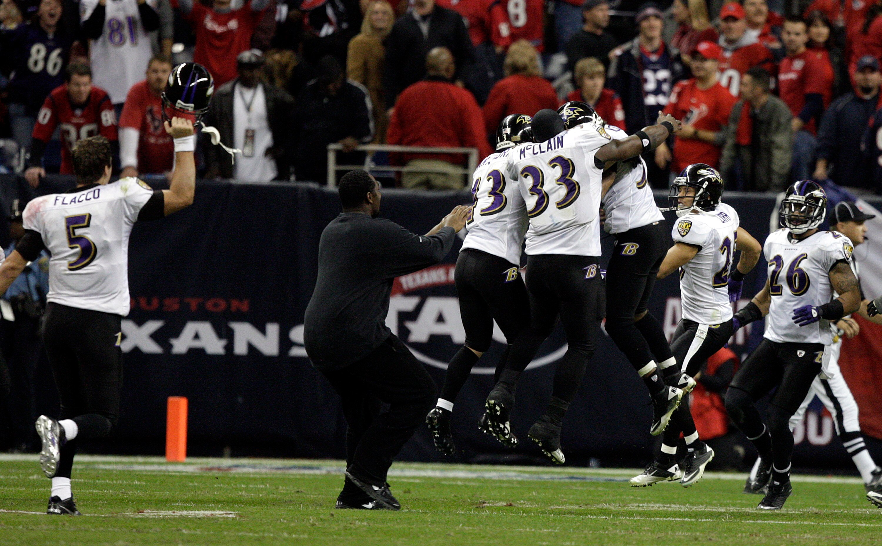 HOUSTON, TX - DECEMBER 13:  Cornerback Josh Wilson #37 of the Baltimore Ravens celebrates intercepting a pass from Matt Schaub of the Houston Texans in overtime at Reliant Stadium on December 13, 2010 in Houston, Texas.  (Photo by Bob Levey/Getty Images)