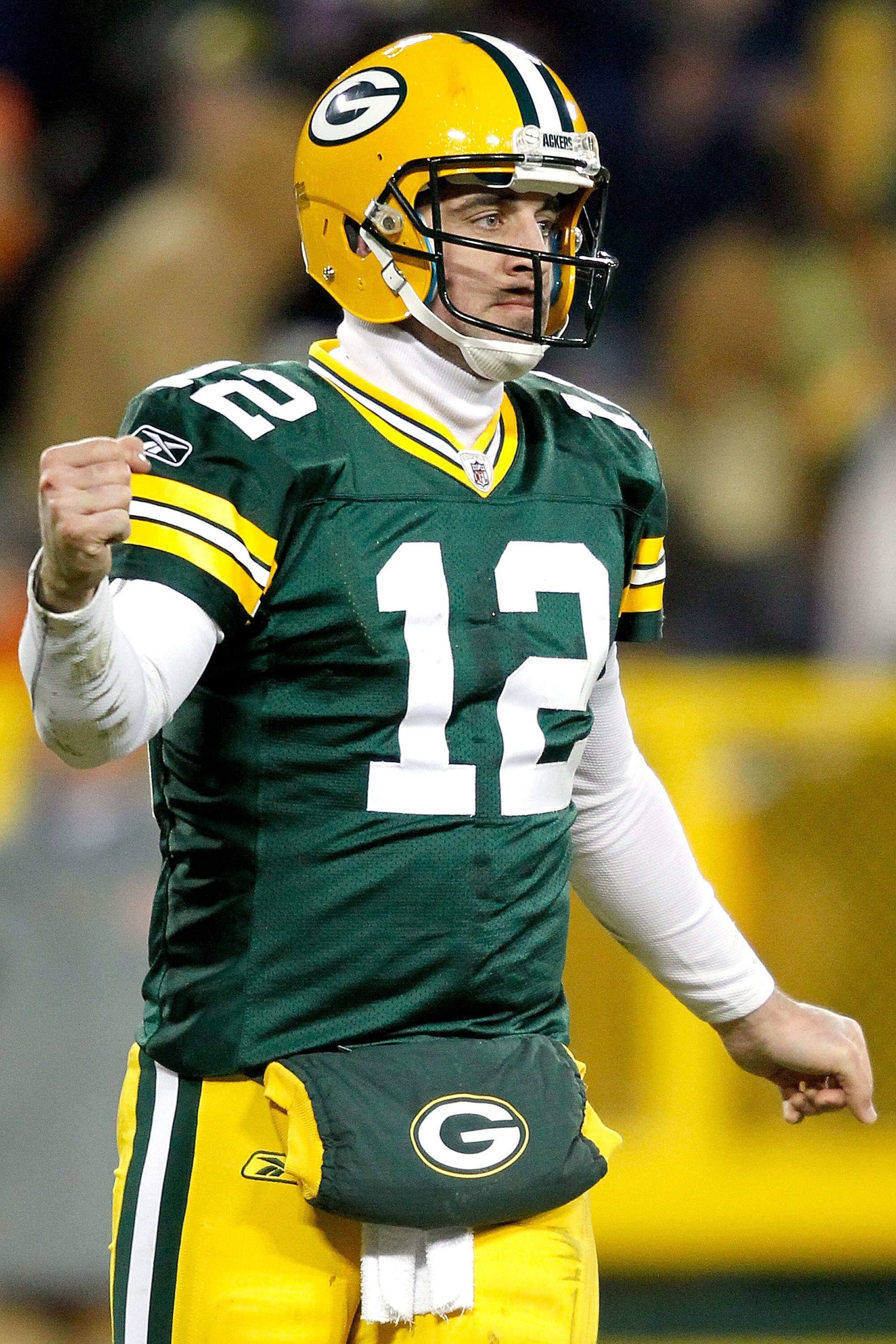 GREEN BAY, WI - JANUARY 02: Quarterback Aaron Rodgers #12 of the Green Bay Packers celebrates a touchdown against the Chicago Bears at Lambeau Field on January 2, 2011 in Green Bay, Wisconsin. (Photo by Matthew Stockman/Getty Images) GREEN BAY, WI - JANUARY 02: Quarterback Aaron Rodgers #12 of the Green Bay Packers celebrates a touchdown against the Chicago Bears at Lambeau Field on January 2, 2011 in Green Bay, Wisconsin. (Photo by Matthew Stockman/Getty Images)