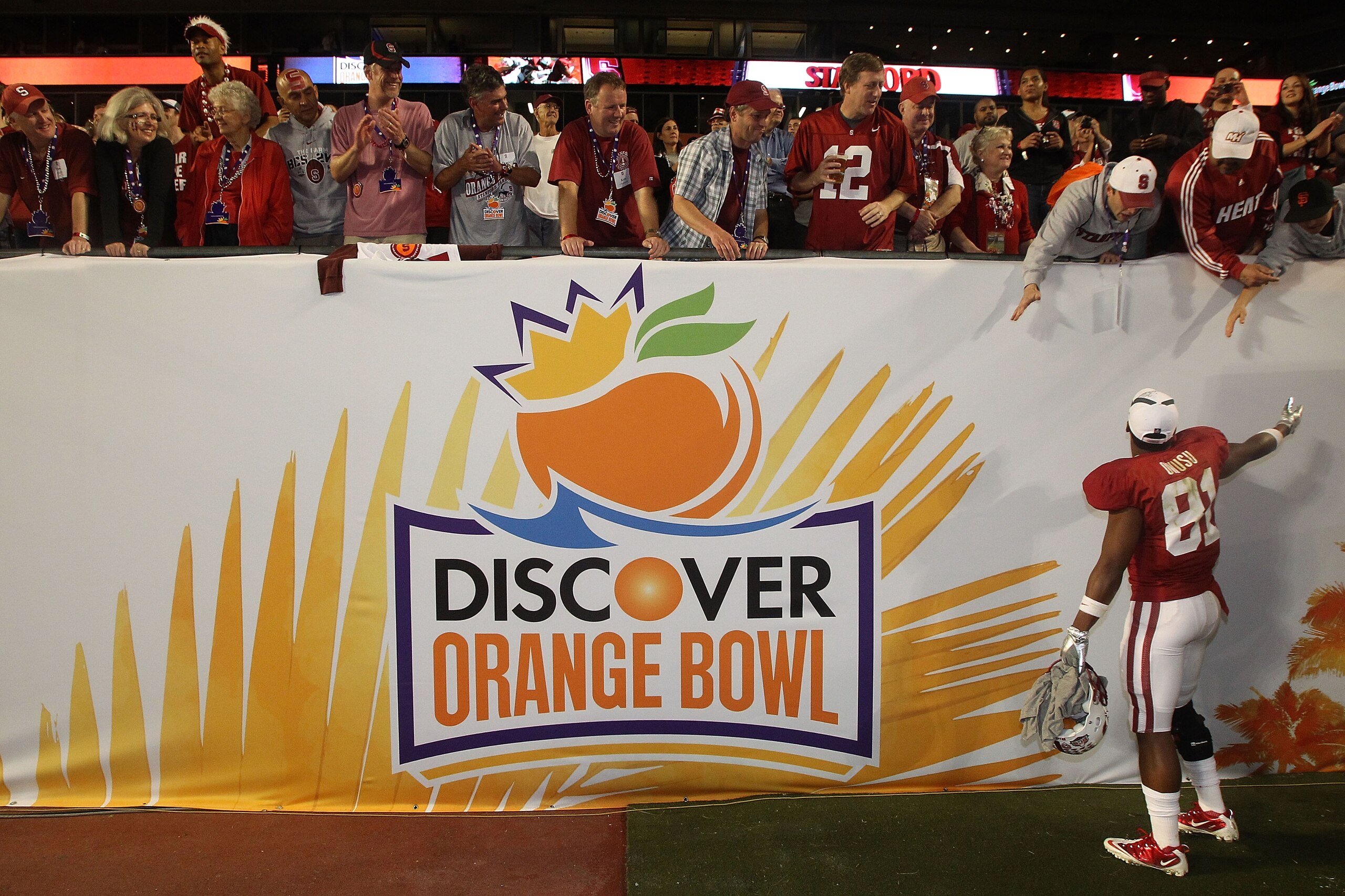 MIAMI, FL - JANUARY 03:  Chris Owusu #81 of the Stanford Cardinal celebrates with fans after Stanford won 40-14 against the Virginia Tech Hokies during the 2011 Discover Orange Bowl at Sun Life Stadium on January 3, 2011 in Miami, Florida.  (Photo by Stre