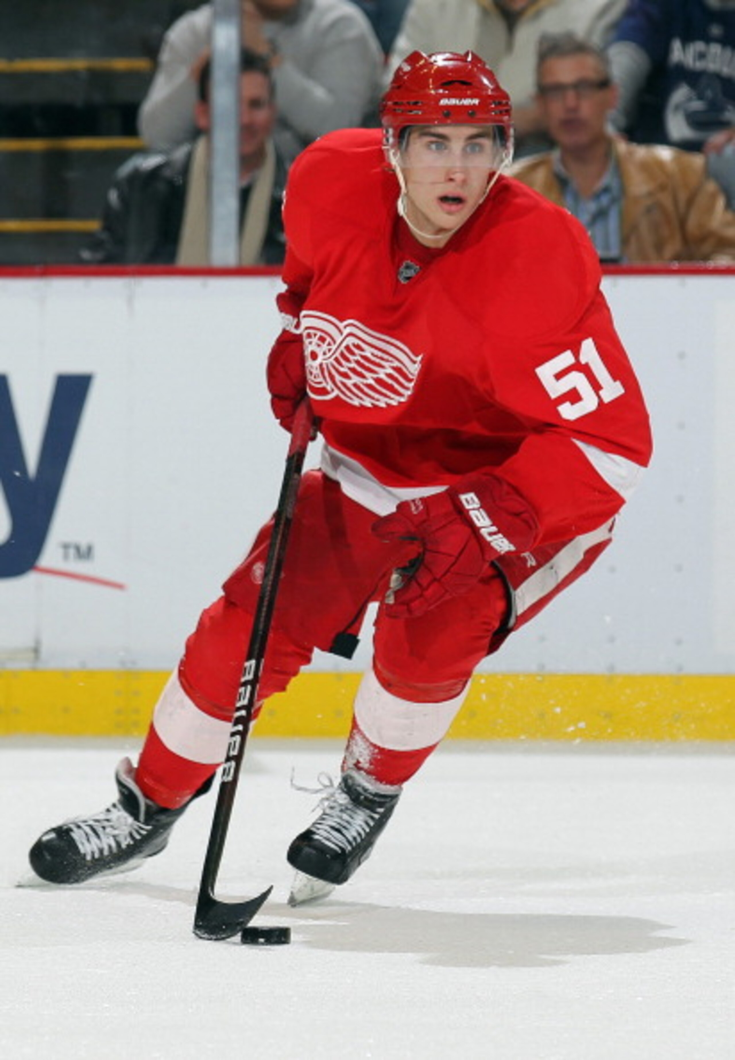 DETROIT, MI - DECEMBER 22:  Valtteri Filppula #51 of the Detroit Red Wings turns with the puck in a game against the Vancouver Canucks on December 22, 2010 at the Joe Louis Arena in Detroit, Michigan. The Wings defeated the Canucks 5-4 in overtime. (Photo