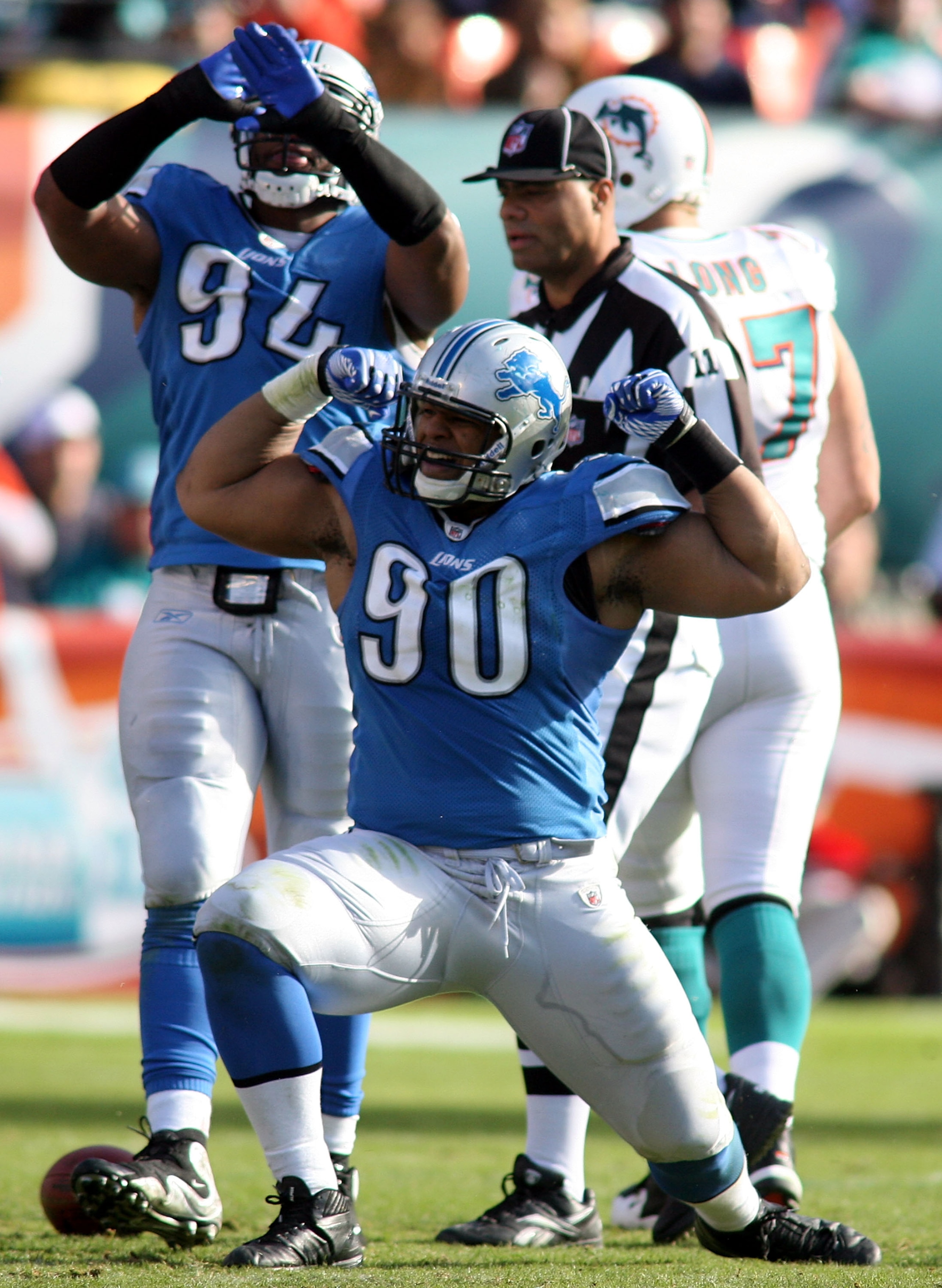 MIAMI - DECEMBER 26:  Lineman Ndamukong Sue #90 celebrates a sack against the Miami Dolphins at Sun Life Stadium on December 26, 2010 in Miami, Florida.  (Photo by Marc Serota/Getty Images)