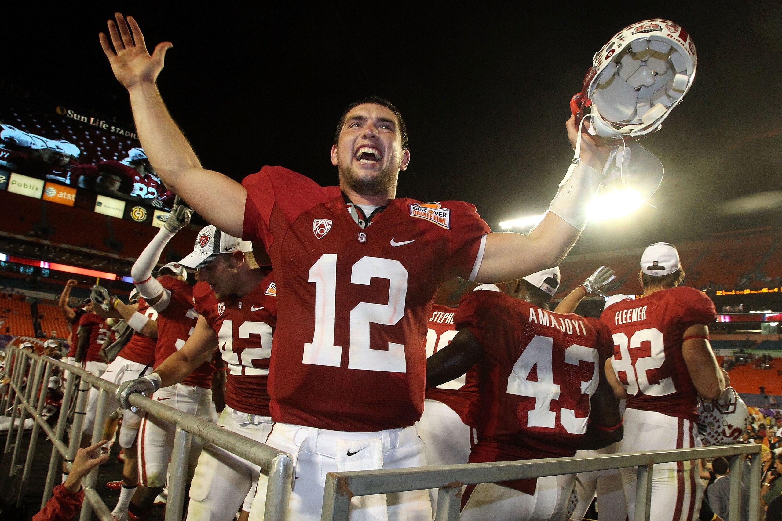 MIAMI, FL - JANUARY 03: Orange bowl MVP Andrew Luck #12 of the Stanford Cardinal celebrates after Stanford won 40-12 against the Virginia Tech Hokies during the 2011 Discover Orange Bowl at Sun Life Stadium on January 3, 2011 in Miami, Florida. (Photo by MIAMI, FL - JANUARY 03: Orange bowl MVP Andrew Luck #12 of the Stanford Cardinal celebrates after Stanford won 40-12 against the Virginia Tech Hokies during the 2011 Discover Orange Bowl at Sun Life Stadium on January 3, 2011 in Miami, Florida. (Photo by