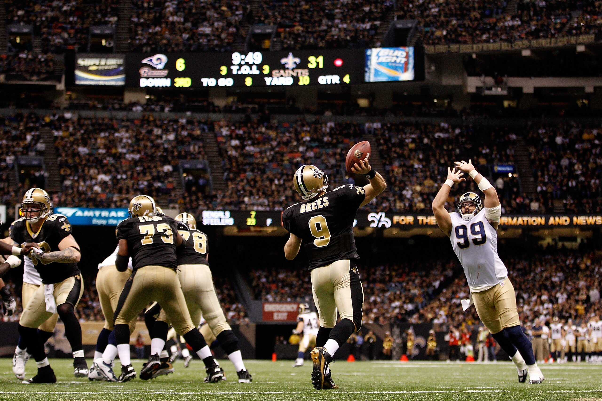 NEW ORLEANS, LA - DECEMBER 12: Drew Brees #9 of the New Orleans Saints throws a pass during the game against the St. Louis Rams at the Louisiana Superdome on December 12, 2010 in New Orleans, Louisiana. The Saints defeated the Rams 31-13. (Photo by Chri NEW ORLEANS, LA - DECEMBER 12: Drew Brees #9 of the New Orleans Saints throws a pass during the game against the St. Louis Rams at the Louisiana Superdome on December 12, 2010 in New Orleans, Louisiana. The Saints defeated the Rams 31-13. (Photo by Chri