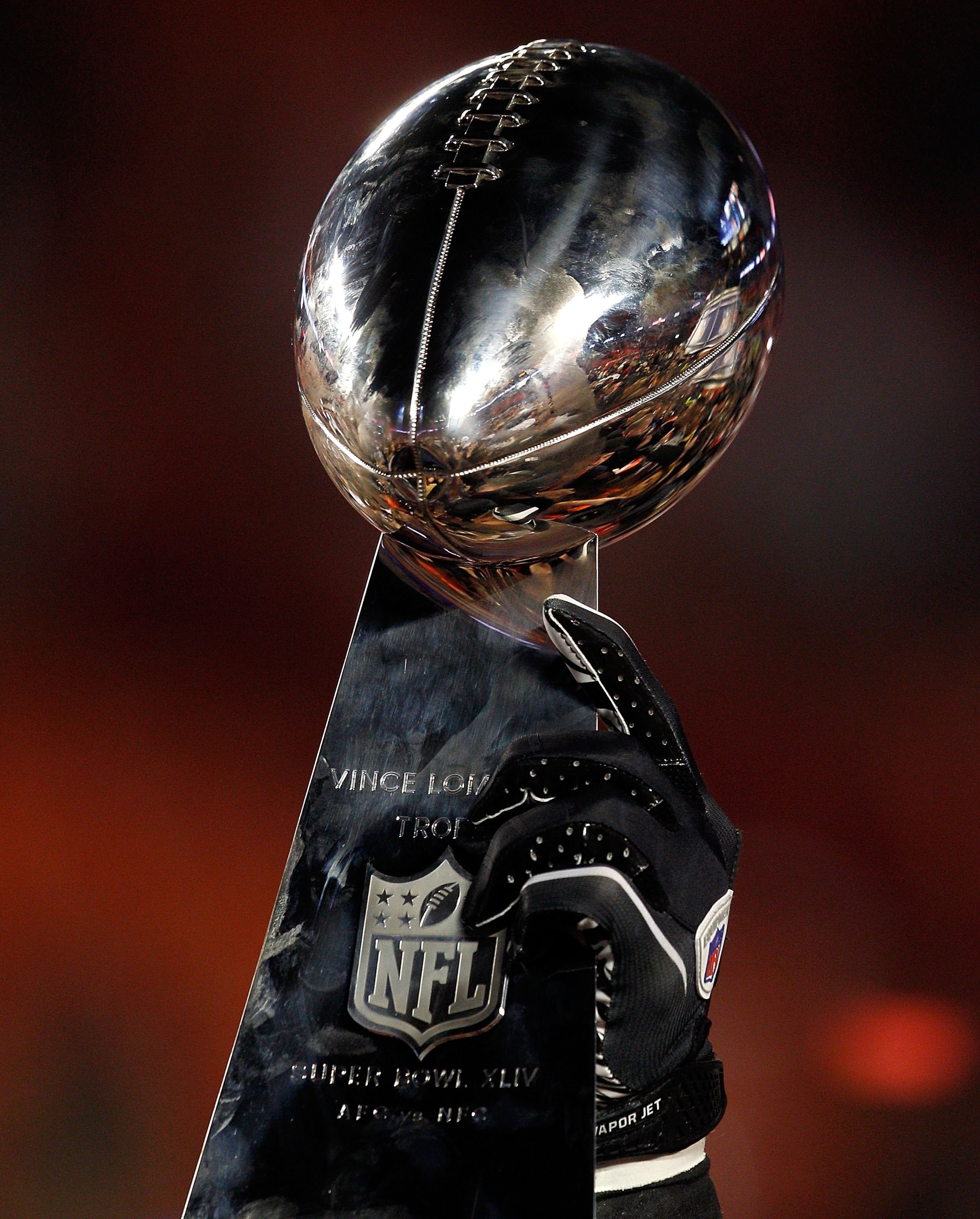 MIAMI GARDENS, FL - FEBRUARY 07: A detail of the Vince Lombardi Trophy as the New Orleans Saints celebrate after defeating the Indianapolis Colts during Super Bowl XLIV on February 7, 2010 at Sun Life Stadium in Miami Gardens, Florida. (Photo by Jonatha MIAMI GARDENS, FL - FEBRUARY 07: A detail of the Vince Lombardi Trophy as the New Orleans Saints celebrate after defeating the Indianapolis Colts during Super Bowl XLIV on February 7, 2010 at Sun Life Stadium in Miami Gardens, Florida. (Photo by Jonatha