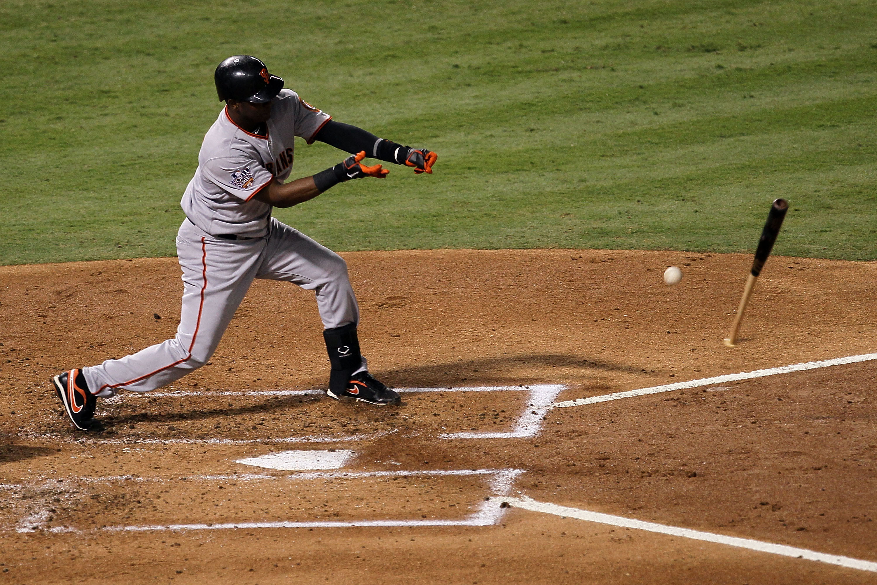 ARLINGTON, TX - OCTOBER 31:  Edgar Renteria #16 of the San Francisco Giants loses the bat in Game Four of the 2010 MLB World Series against the Texas Rangers at Rangers Ballpark in Arlington on October 31, 2010 in Arlington, Texas.  (Photo by Stephen Dunn
