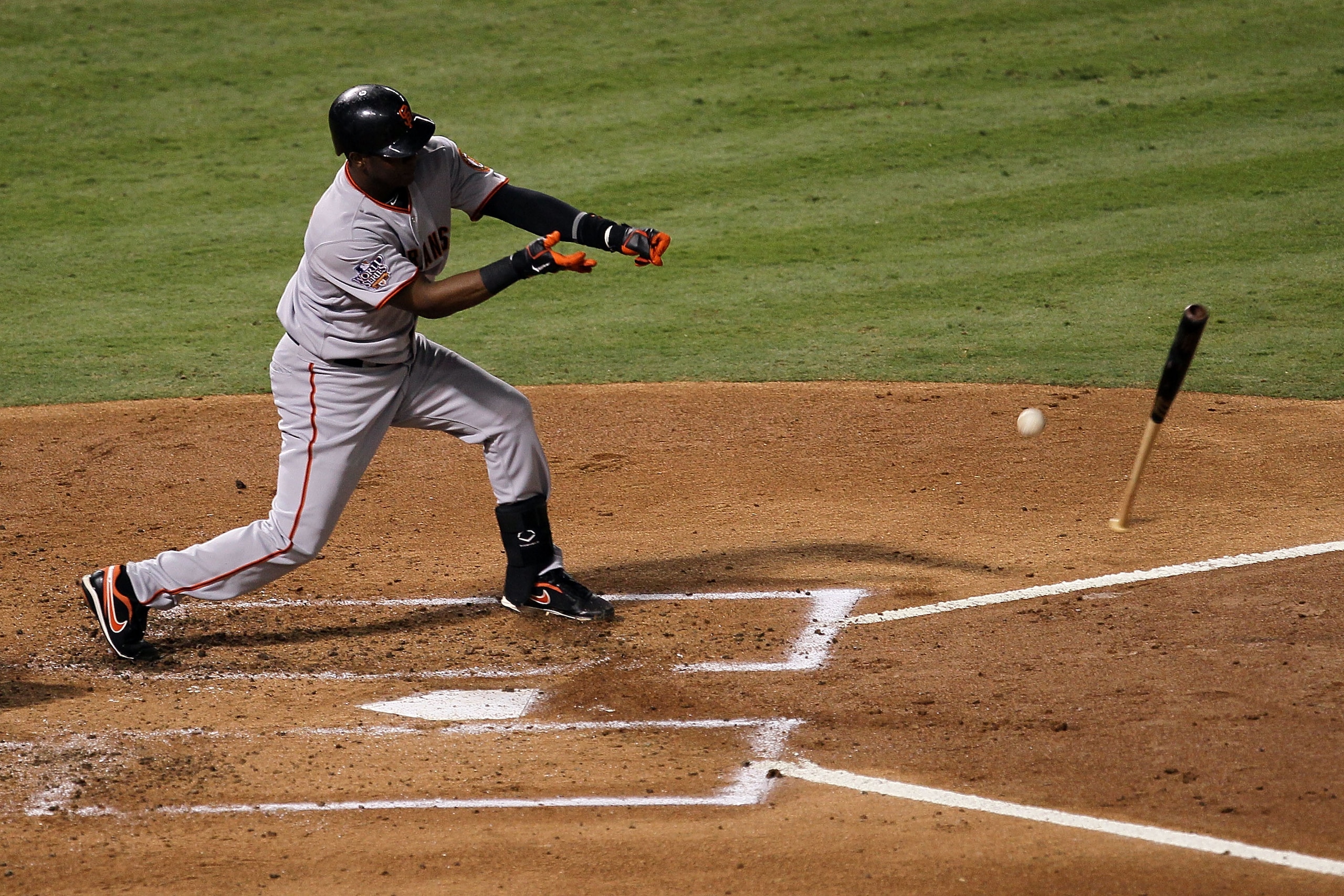 ARLINGTON, TX - OCTOBER 31:  Edgar Renteria #16 of the San Francisco Giants loses the bat in Game Four of the 2010 MLB World Series against the Texas Rangers at Rangers Ballpark in Arlington on October 31, 2010 in Arlington, Texas.  (Photo by Stephen Dunn