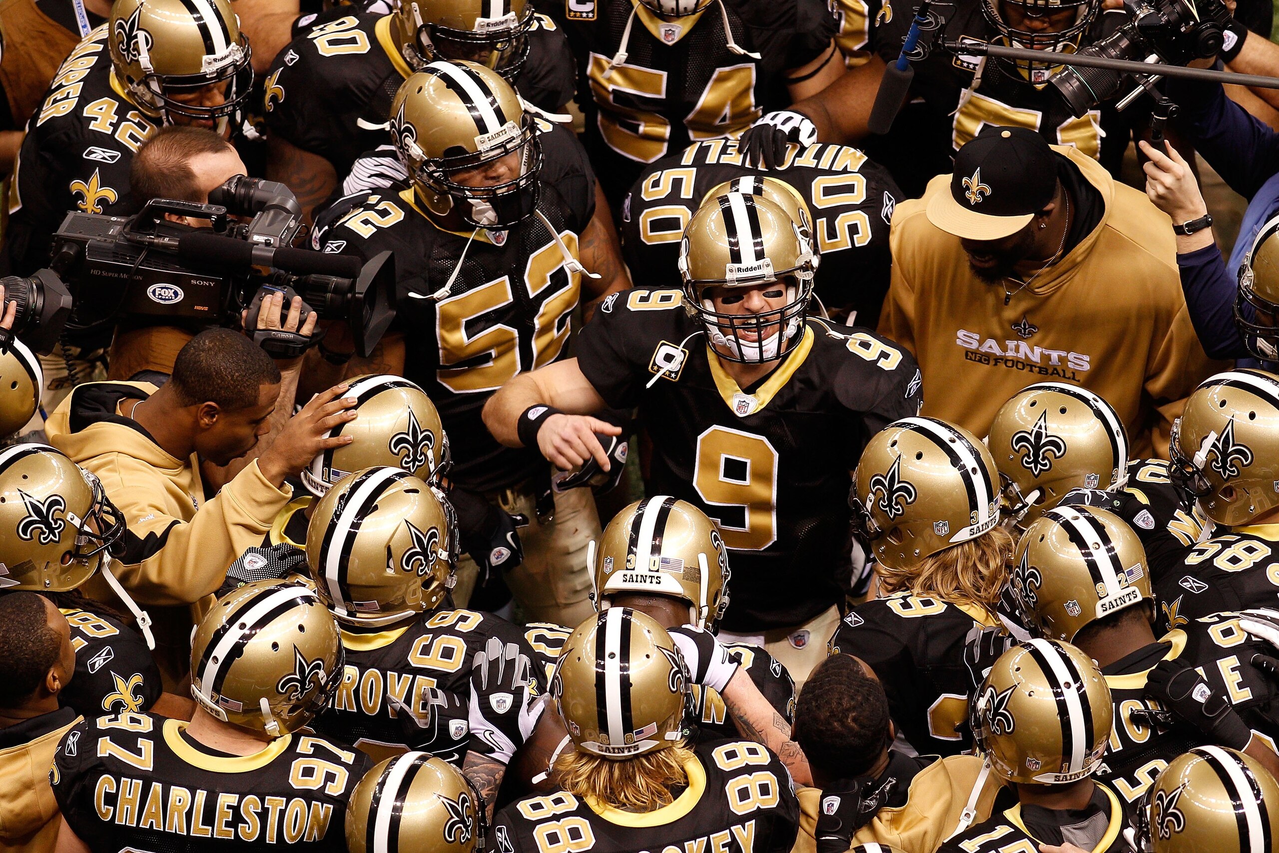 NEW ORLEANS - JANUARY 24: Quarterback Drew Brees #9 of the New Orleans Saints addresses his teammates prior to playing against the Minnesota Vikings during the NFC Championship Game at the Louisiana Superdome on January 24, 2010 in New Orleans, Louisiana NEW ORLEANS - JANUARY 24: Quarterback Drew Brees #9 of the New Orleans Saints addresses his teammates prior to playing against the Minnesota Vikings during the NFC Championship Game at the Louisiana Superdome on January 24, 2010 in New Orleans, Louisiana
