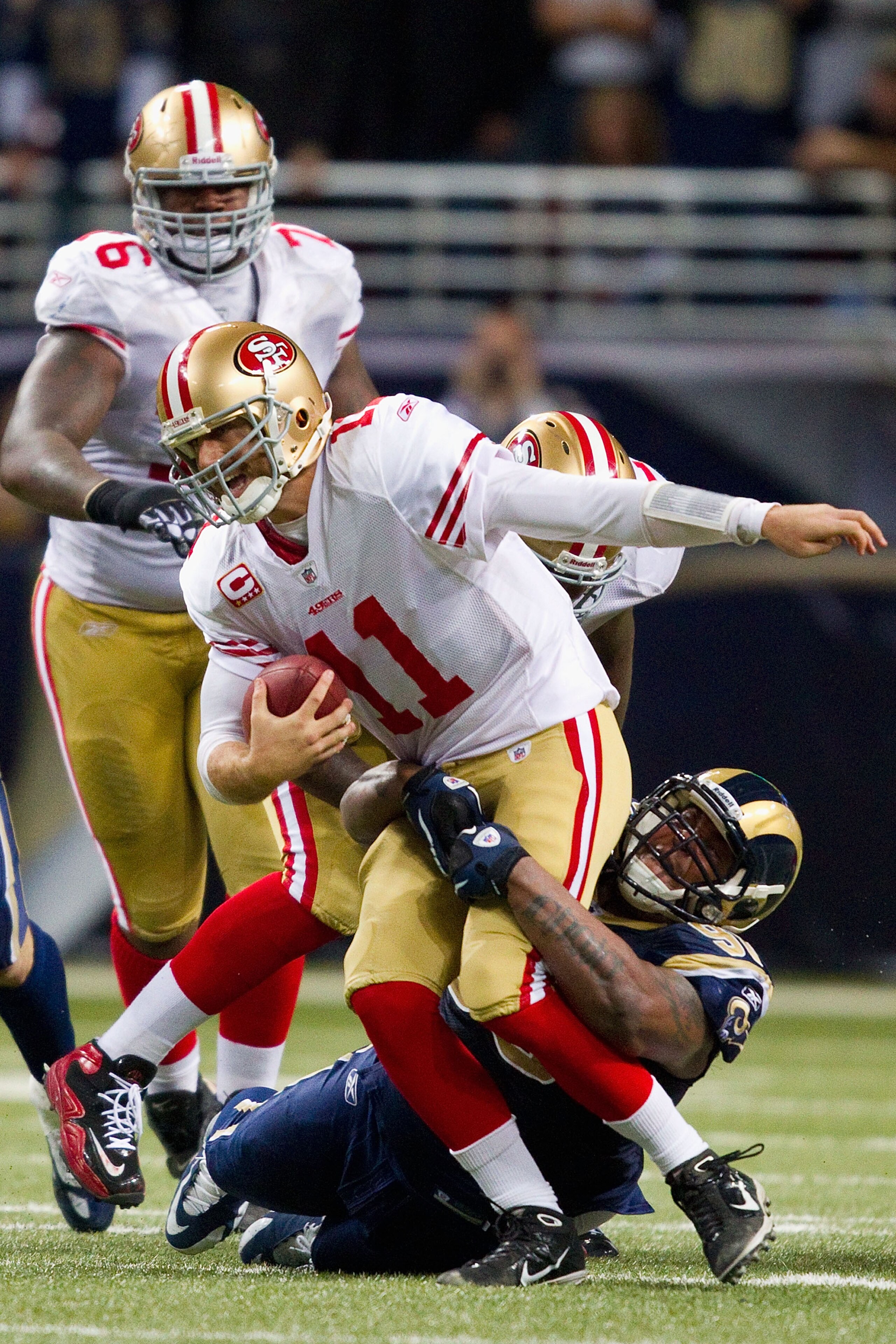 ST. LOUIS, MO - DECEMBER 26: Fred Robbins #98 of the St. Louis Rams sacks Alex Smith #11 of the San Francisco 49ers at the Edward Jones Dome on December 26, 2010 in St. Louis, Missouri. The Rams beat the 49ers 25-17. (Photo by Dilip Vishwanat/Getty Images ST. LOUIS, MO - DECEMBER 26: Fred Robbins #98 of the St. Louis Rams sacks Alex Smith #11 of the San Francisco 49ers at the Edward Jones Dome on December 26, 2010 in St. Louis, Missouri. The Rams beat the 49ers 25-17. (Photo by Dilip Vishwanat/Getty Images