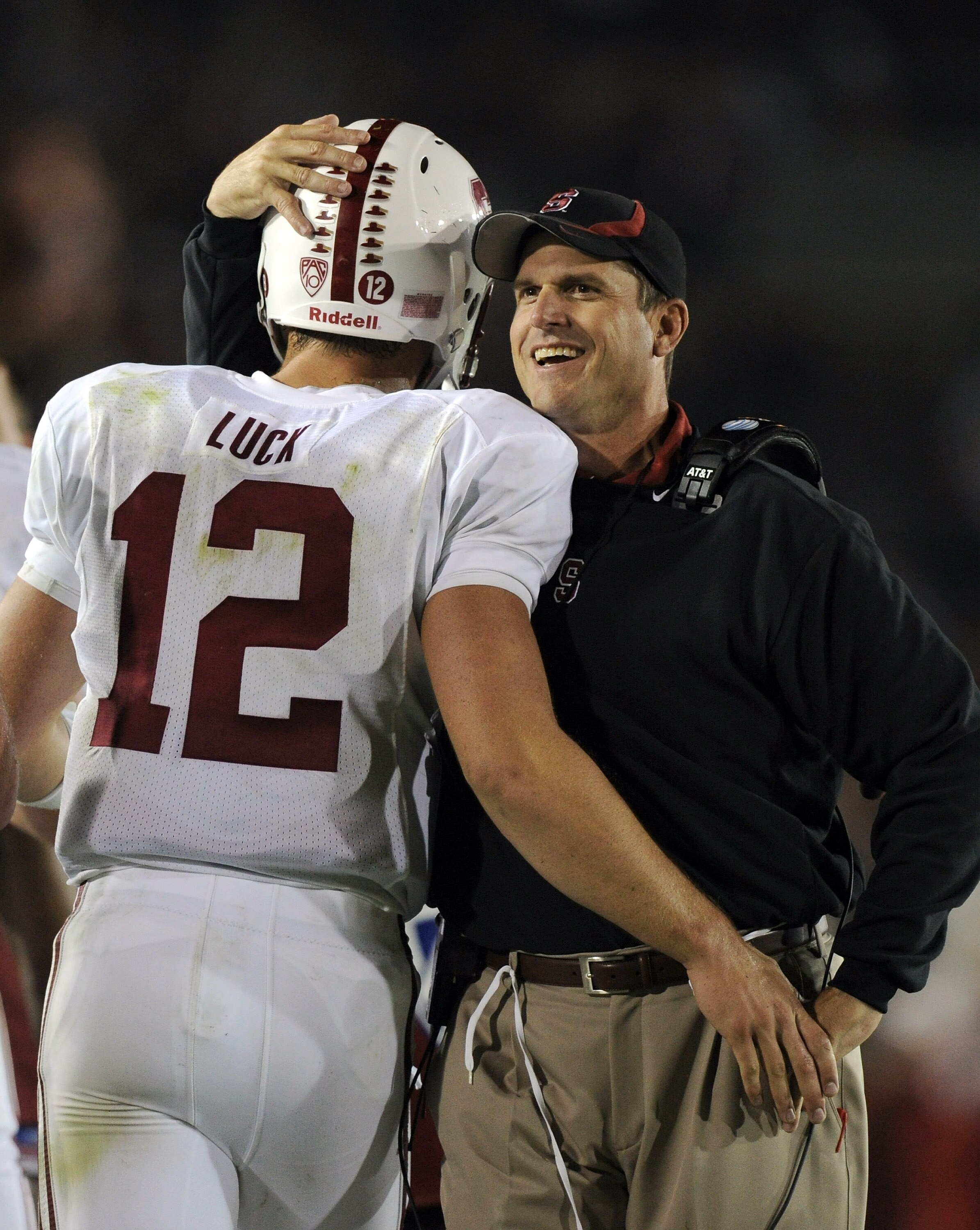 PASADENA, CA - SEPTEMBER 11:  Head Coach Jim Harbaugh of Stanford celebrates a touchdown with Andrew Luck #12 for a 35-0 lead over UCLA at the Rose Bowl on September 11, 2010 in Pasadena, California.  (Photo by Harry How/Getty Images)