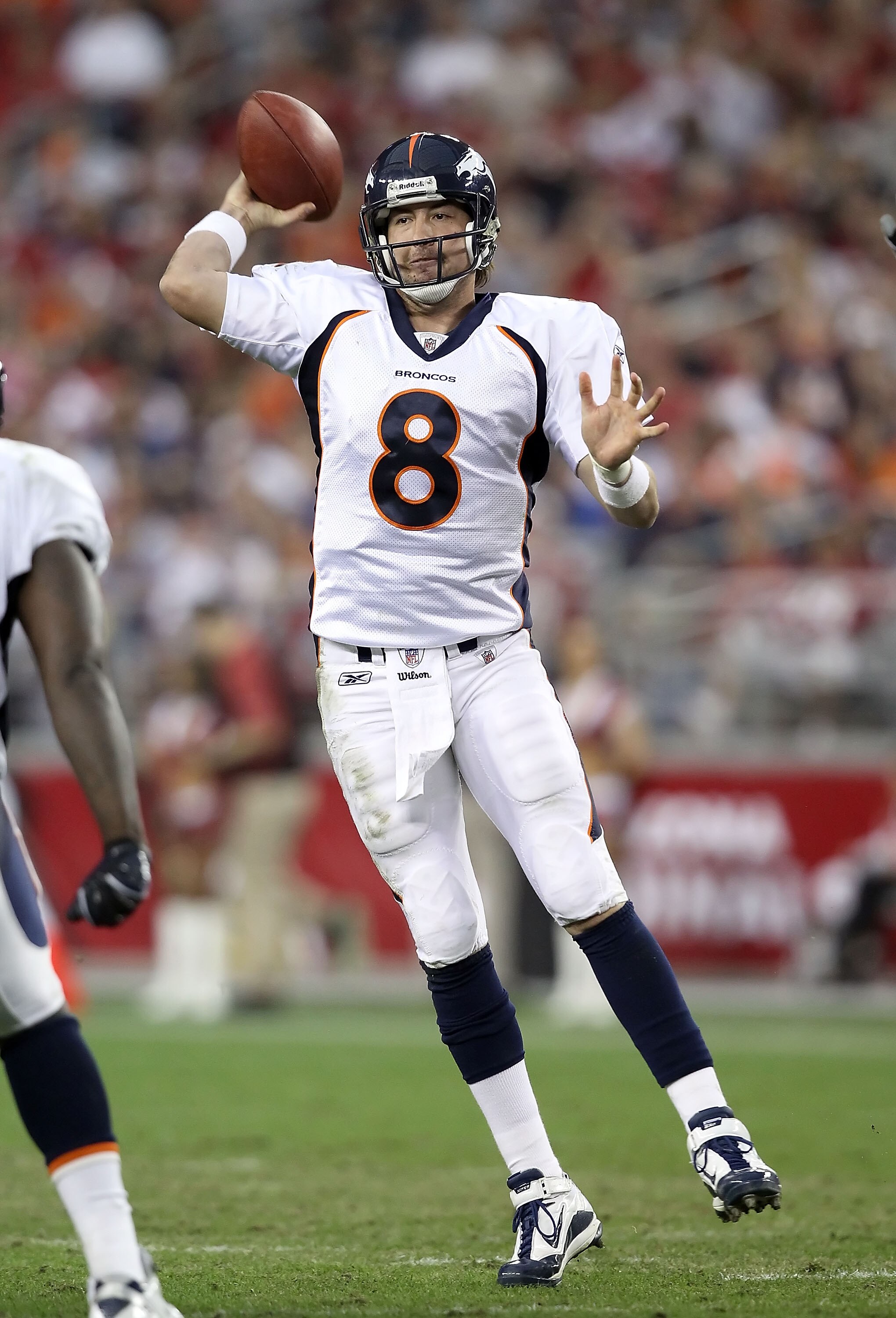 GLENDALE, AZ - DECEMBER 12:  Quarterback Kyle Orton #8 of the Denver Broncos throws a pass during the NFL game against the Arizona Cardinals at the University of Phoenix Stadium on December 12, 2010 in Glendale, Arizona.  The Cardinals defeated the Bronco