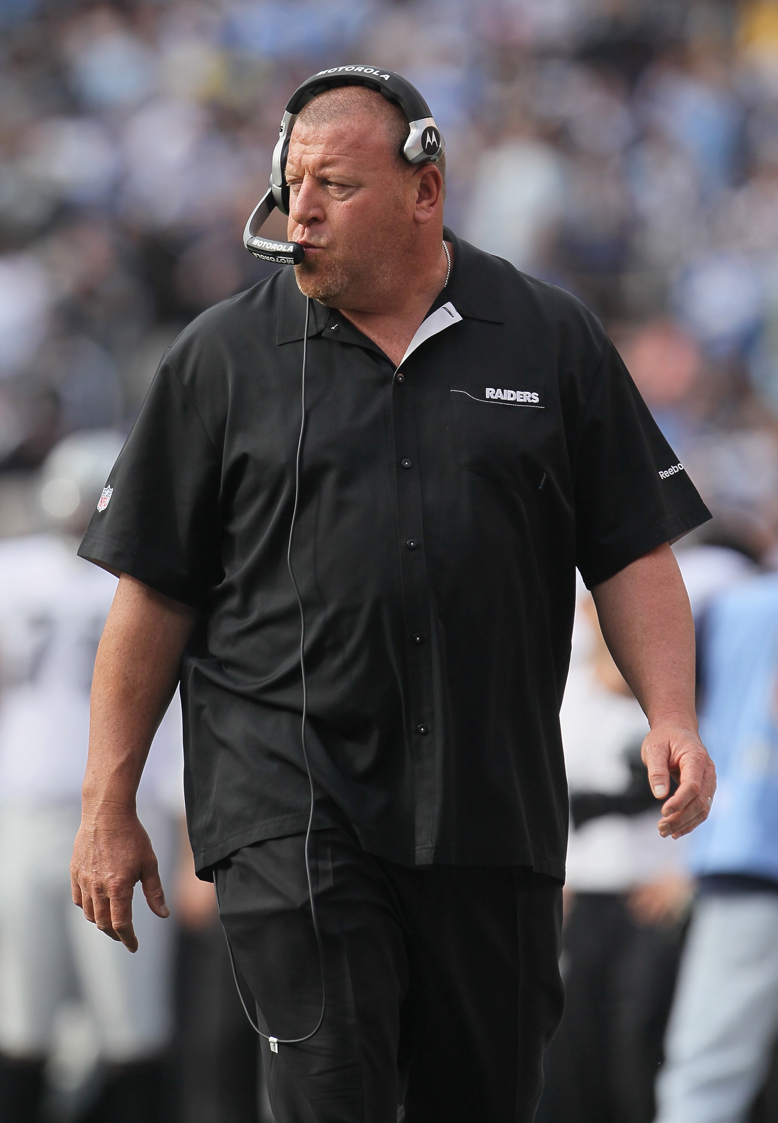 SAN DIEGO - DECEMBER 05: Oakland Raiders head coach Tom Cable looks on from the sideline against the San Diego Chargers at Qualcomm Stadium on December 5, 2010 in San Diego, California. The Raiders defeated the Chargers 28-13. (Photo by Jeff Gross/Getty SAN DIEGO - DECEMBER 05: Oakland Raiders head coach Tom Cable looks on from the sideline against the San Diego Chargers at Qualcomm Stadium on December 5, 2010 in San Diego, California. The Raiders defeated the Chargers 28-13. (Photo by Jeff Gross/Getty