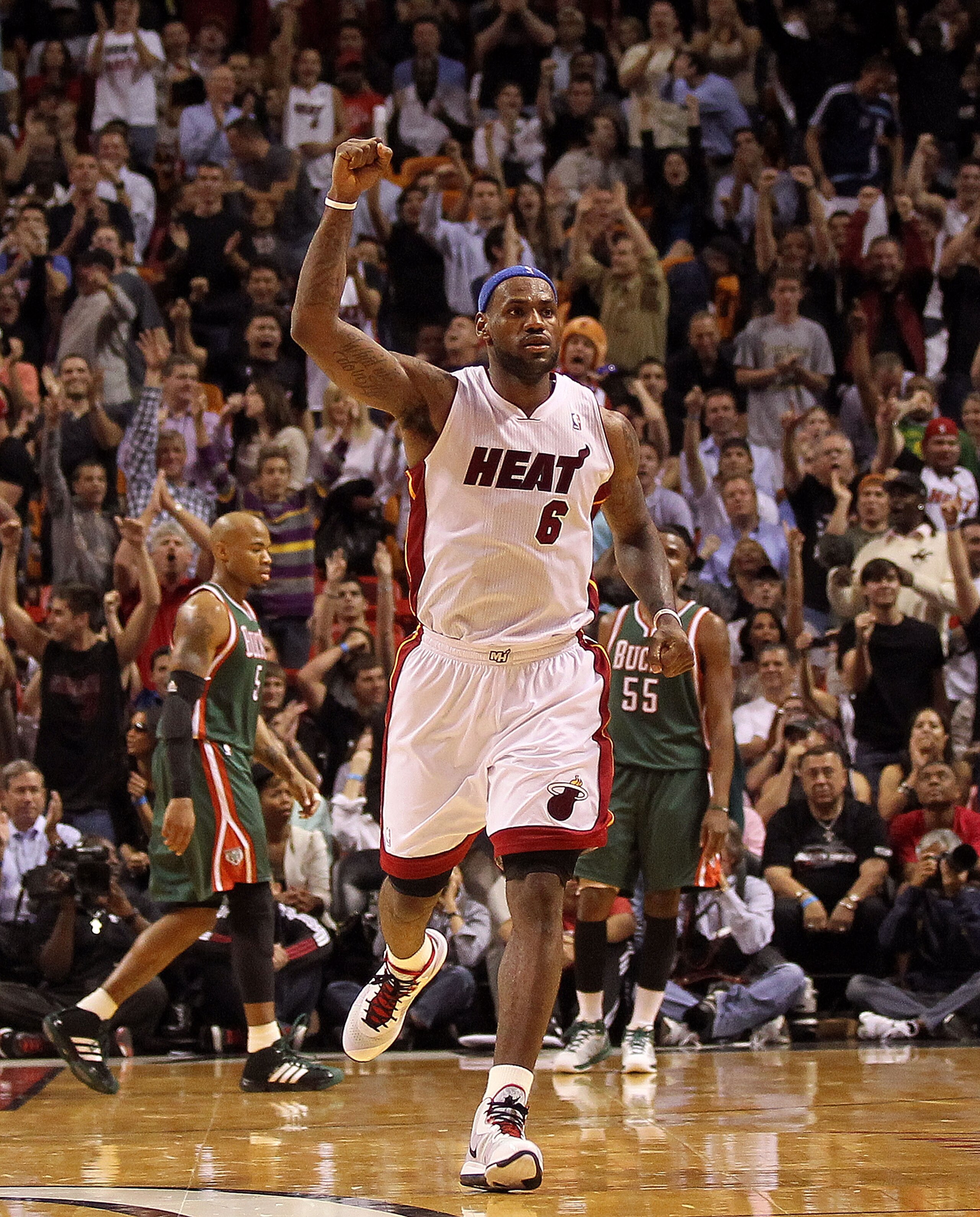 MIAMI, FL - JANUARY 04:  LeBron James #6 of the Miami Heat reacts after Mario Chalmers #15 hit a 3 pointer late in the game against the Milwaukee Bucks at American Airlines Arena on January 4, 2011 in Miami, Florida. NOTE TO USER: User expressly acknowled