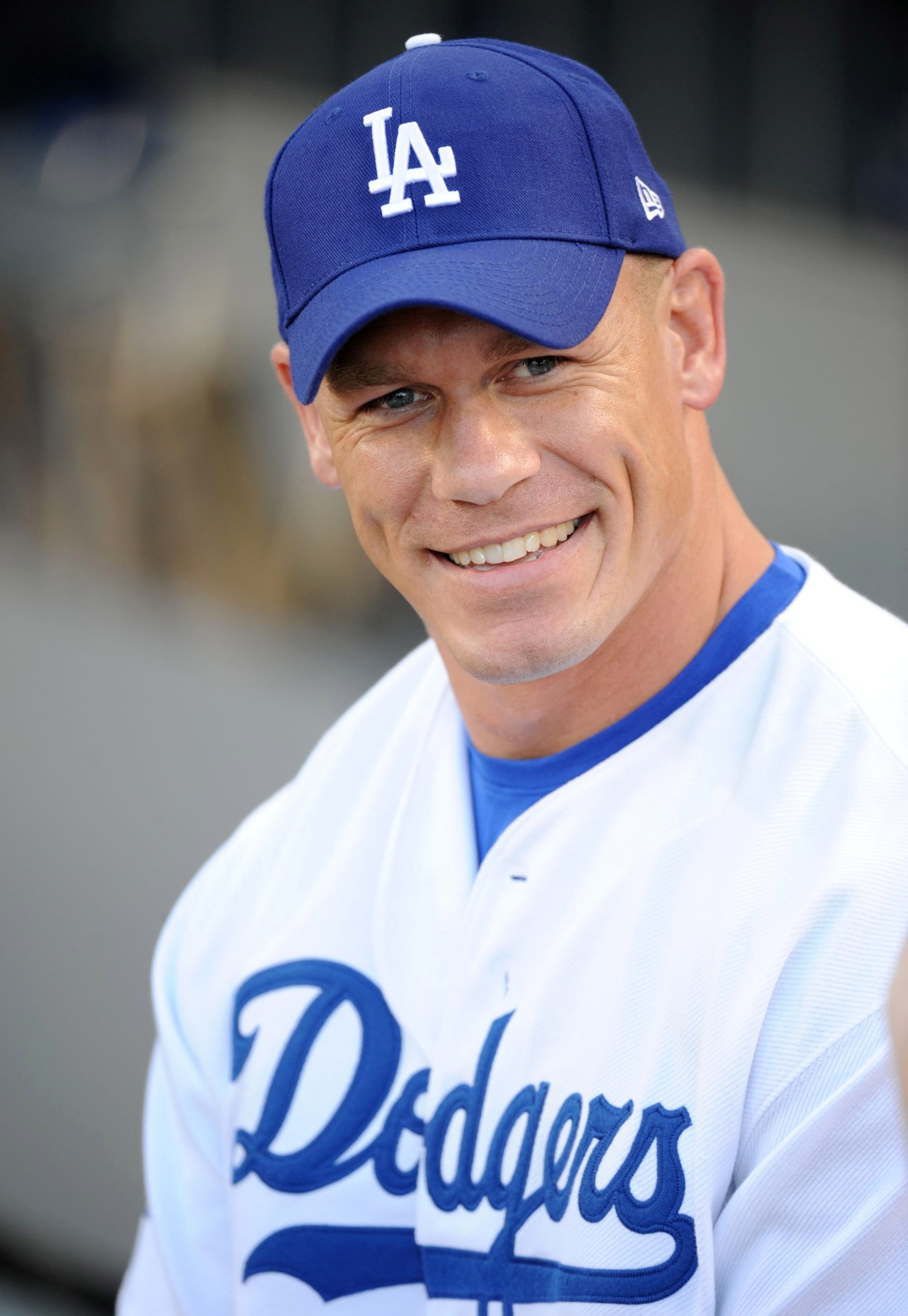 LOS ANGELES - AUGUST 20: WWE Superstar John Cena smiles before throwing out the first pitch before the game between the Chicago Cubs and the Los Angeles Dodgers at Dodger Stadium on August 20, 2009 in Los Angeles, California. (Photo by Harry How/Getty Ima