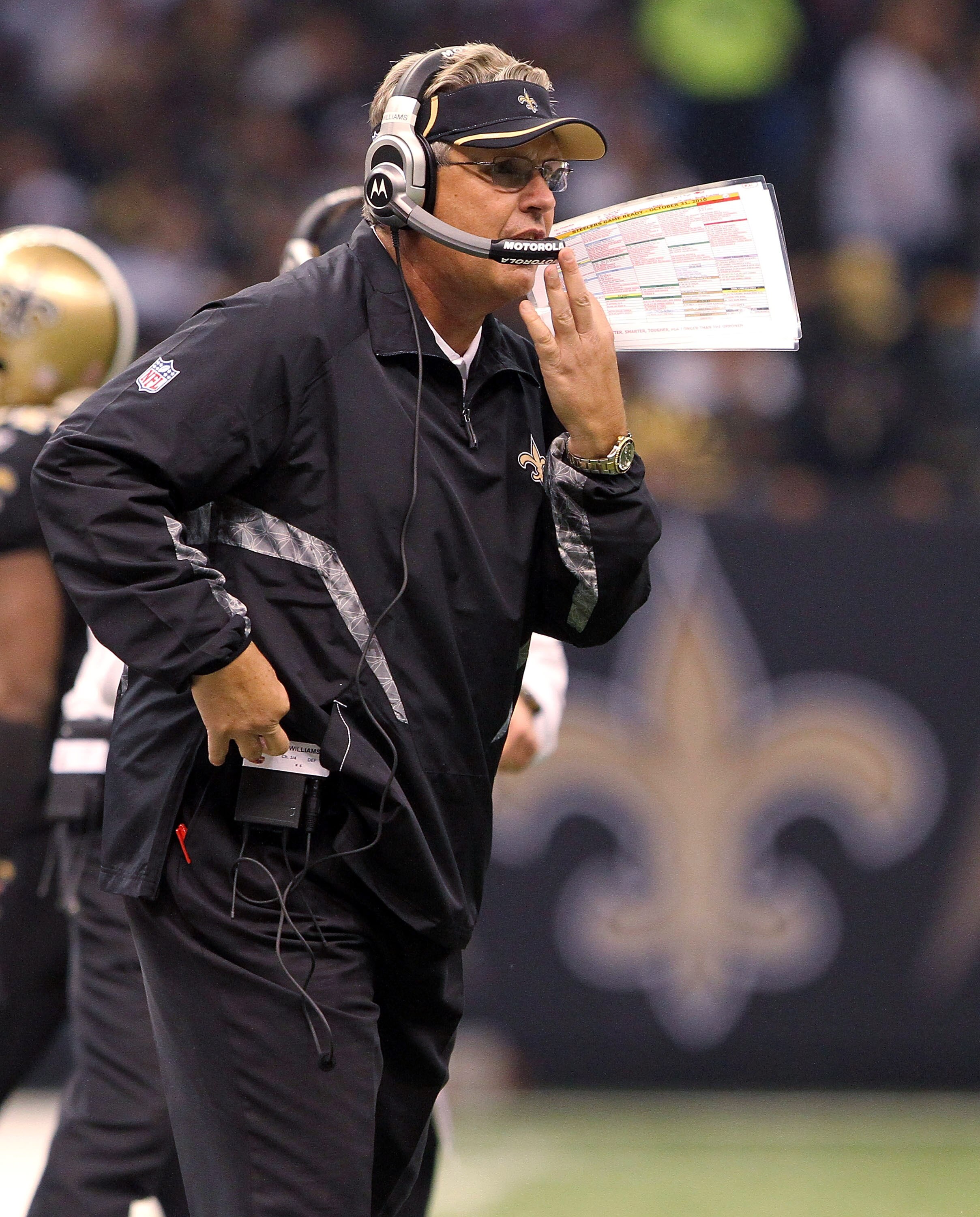 NEW ORLEANS, LA - OCTOBER 31: Defensive coordinator Gregg Williams of the New Orleans Saints talks to the defense from the sidelines during the game against the Pittsburgh Steelers at the Louisiana Superdome on October 31, 2010 in New Orleans, Louisiana.