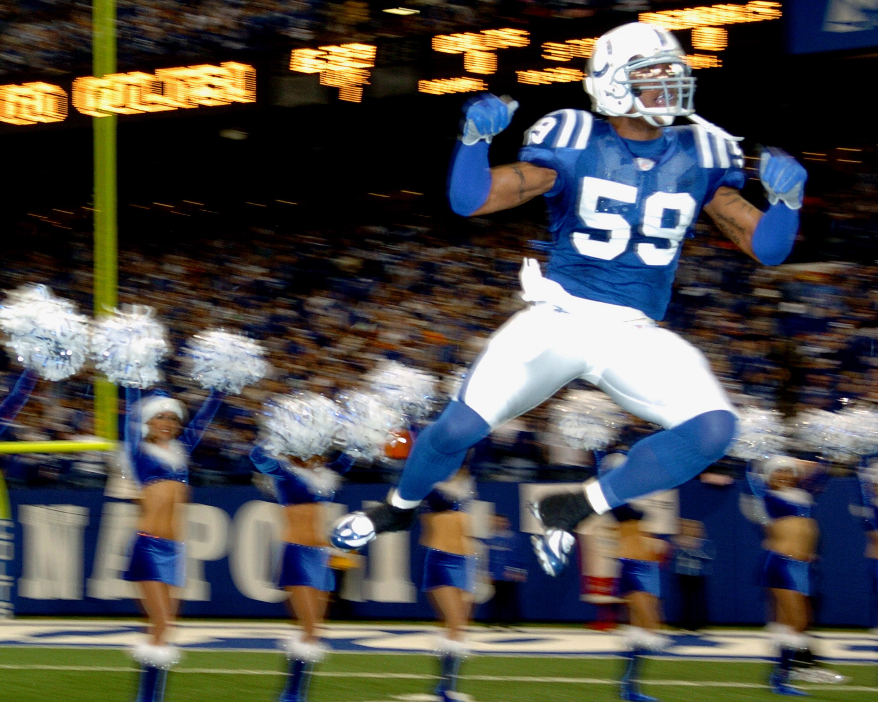Indianapolis Colts linebacker Cato June during pre-game introductions against the Cincinnati Bengals  Dec. 18, 2006 in the RCA Dome in Indianapolis.  The Colts won 34 - 16.  (Photo by Al Messerschmidt/Getty Images)