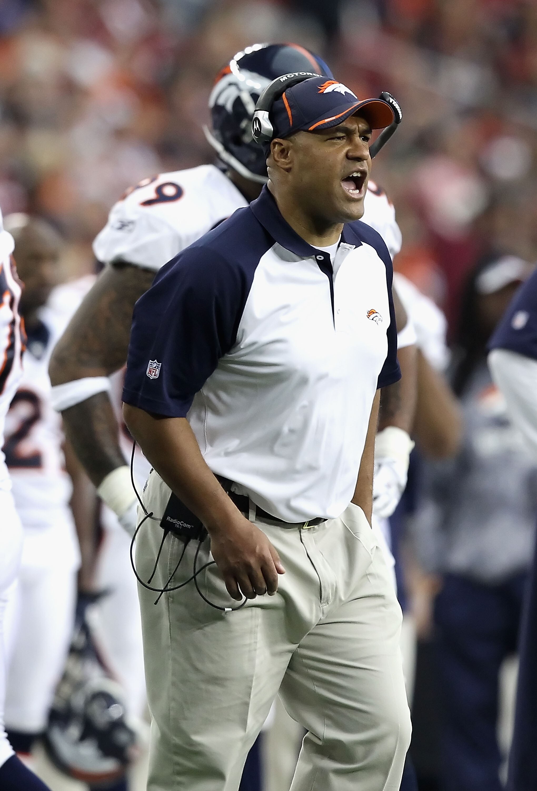 GLENDALE, AZ - DECEMBER 12:  Interim head coach Eric Studesville of the Denver Broncos reacts during the NFL game against the Arizona Cardinals at the University of Phoenix Stadium on December 12, 2010 in Glendale, Arizona. The Cardinals defeated the Bron