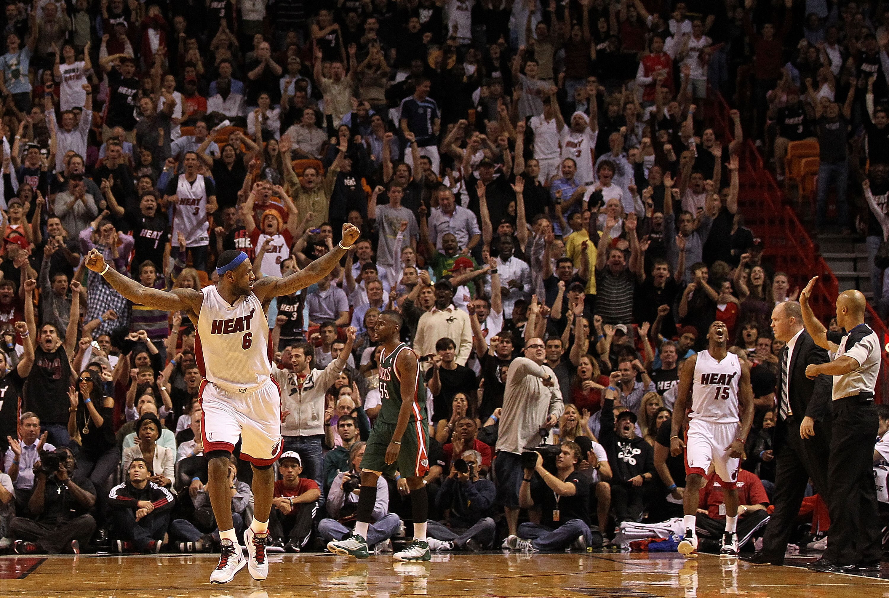 MIAMI, FL - JANUARY 04:  LeBron James #6 of the Miami Heat reacts after Mario Chalmers #15 hit a 3 pointer late in the game against the Milwaukee Bucks at American Airlines Arena on January 4, 2011 in Miami, Florida. NOTE TO USER: User expressly acknowled