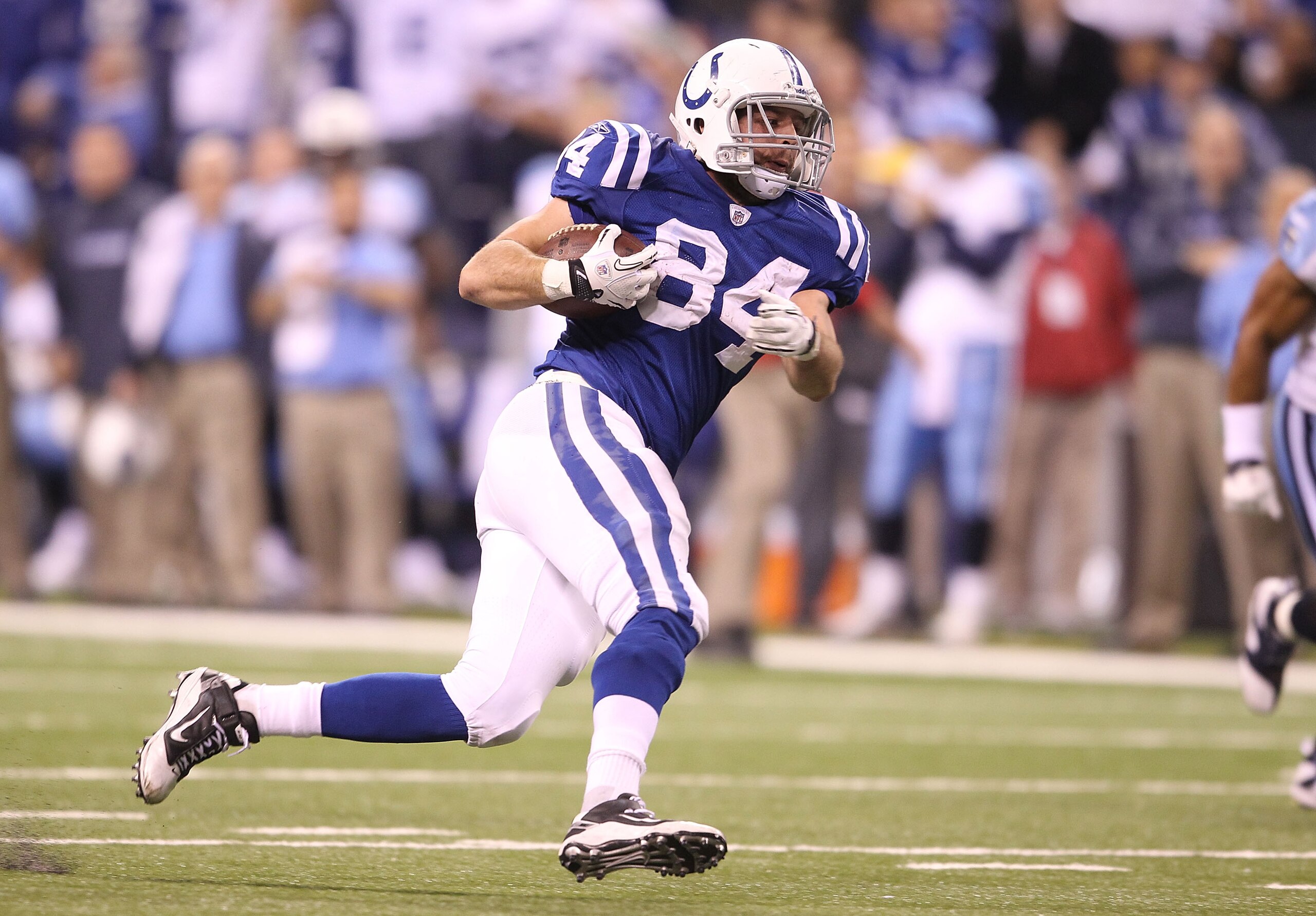 INDIANAPOLIS - JANUARY 02: Jacob Tamme #84 of the Indianapolis Colts runs with the ball during NFL game against the Tennessee Titans at Lucas Oil Stadium on January 2, 2011 in Indianapolis, Indiana. (Photo by Andy Lyons/Getty Images) INDIANAPOLIS - JANUARY 02: Jacob Tamme #84 of the Indianapolis Colts runs with the ball during NFL game against the Tennessee Titans at Lucas Oil Stadium on January 2, 2011 in Indianapolis, Indiana. (Photo by Andy Lyons/Getty Images)