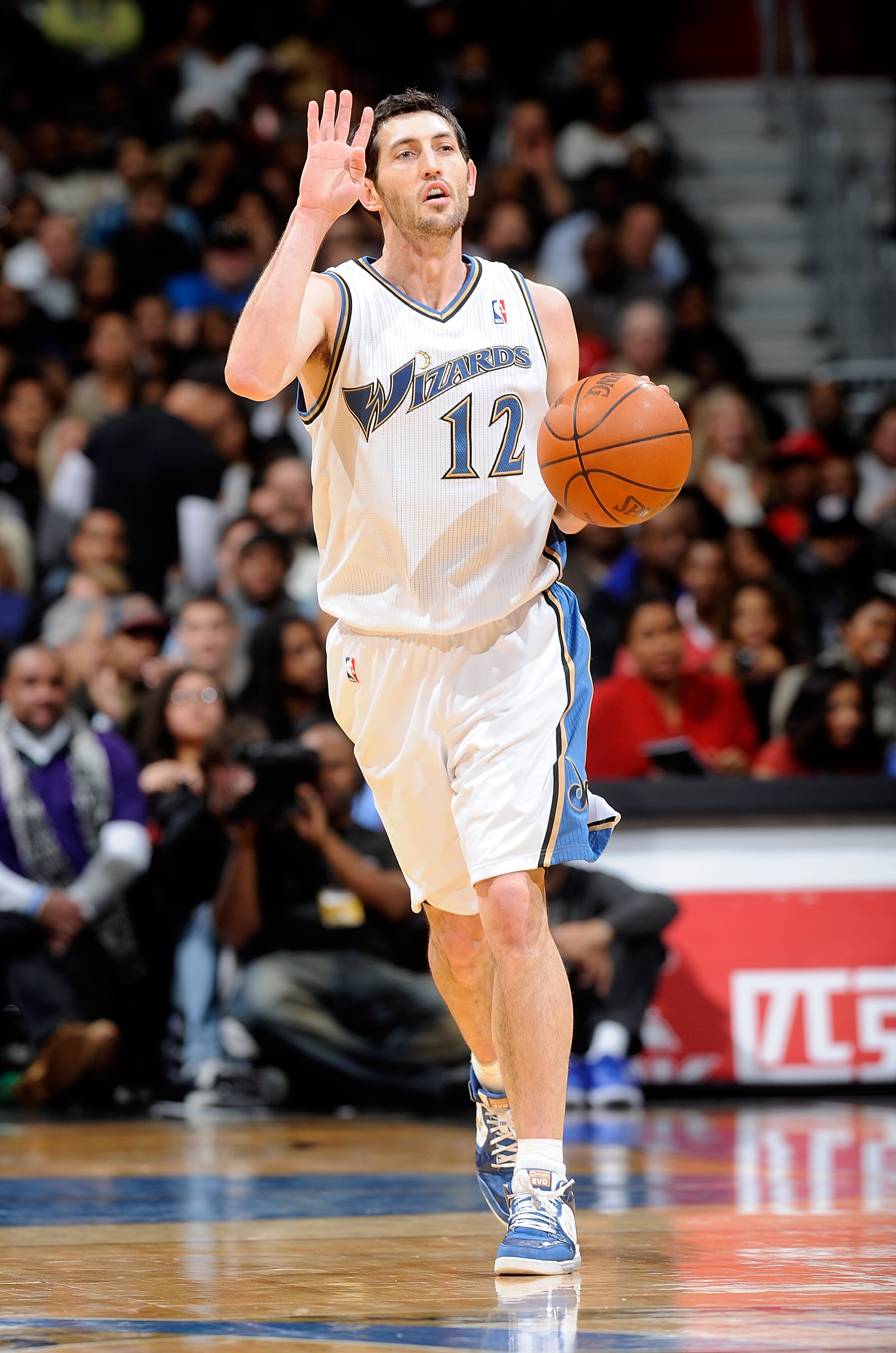 WASHINGTON, DC - DECEMBER 18:  Kirk Hinrich #12 of the Washington Wizards handles the ball against the Miami Heat at the Verizon Center on December 18, 2010 in Washington, DC. NOTE TO USER: User expressly acknowledges and agrees that, by downloading and o
