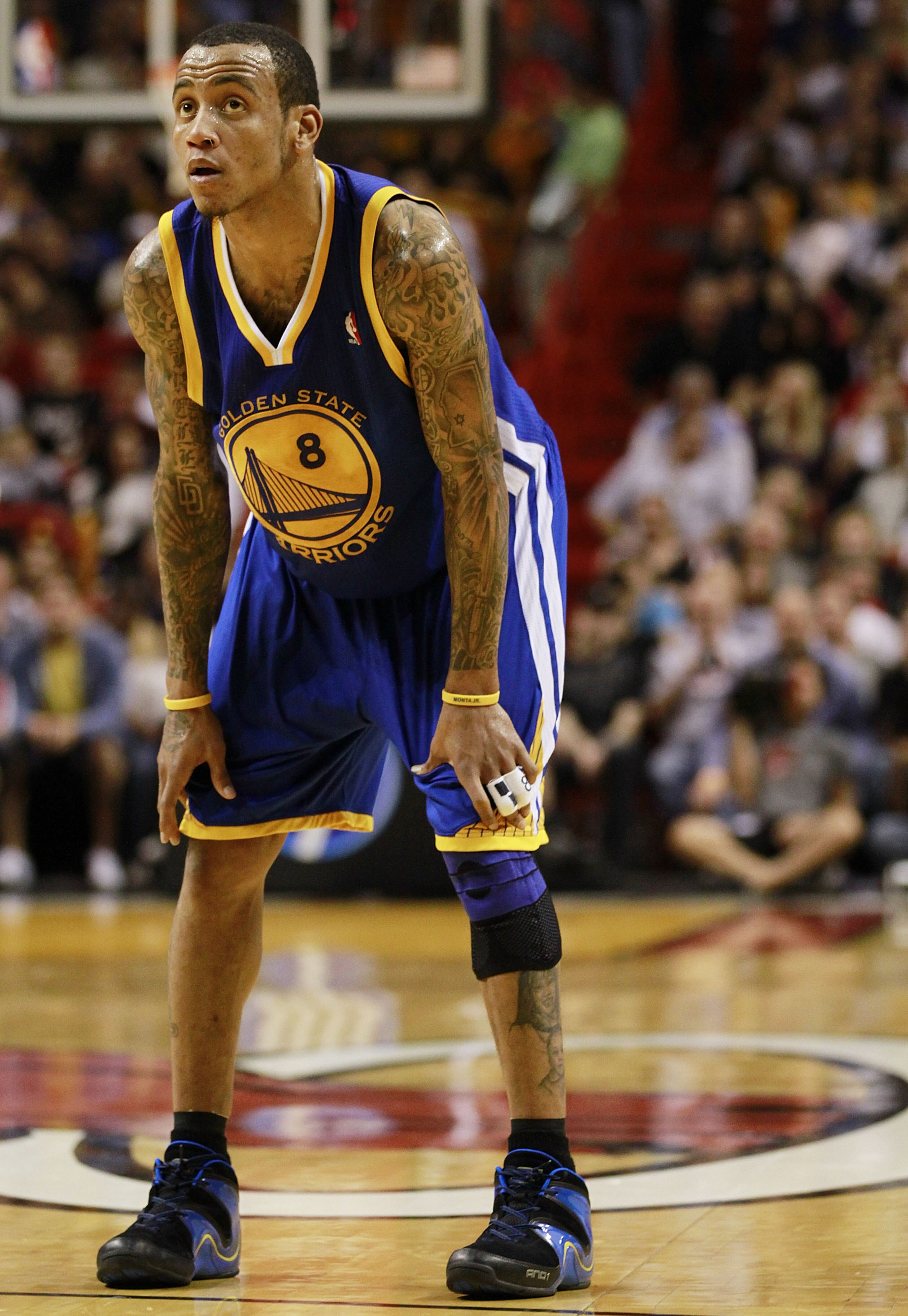 MIAMI - JANUARY 01:  Monta Ellis # 8 of the Golden State Warriors looks on during a game against the Miami Heat at American Airlines Arena on January 1, 2011 in Miami, Florida. The Heat won 114-107. NOTE TO USER: User expressly acknowledges and agrees tha