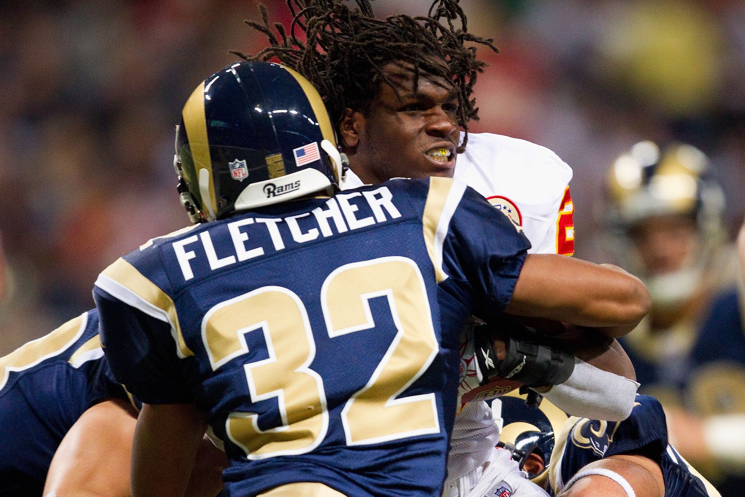 ST. LOUIS, MO - DECEMBER 19: Jamaal Charles #25 of the Kansas City Chiefs looses his helmet while rushing against the St. Louis Rams at the Edward Jones Dome on December 19, 2010 in St. Louis, Missouri. The Chiefs beat the Rams 27-13. (Photo by Dilip Vi ST. LOUIS, MO - DECEMBER 19: Jamaal Charles #25 of the Kansas City Chiefs looses his helmet while rushing against the St. Louis Rams at the Edward Jones Dome on December 19, 2010 in St. Louis, Missouri. The Chiefs beat the Rams 27-13. (Photo by Dilip Vi