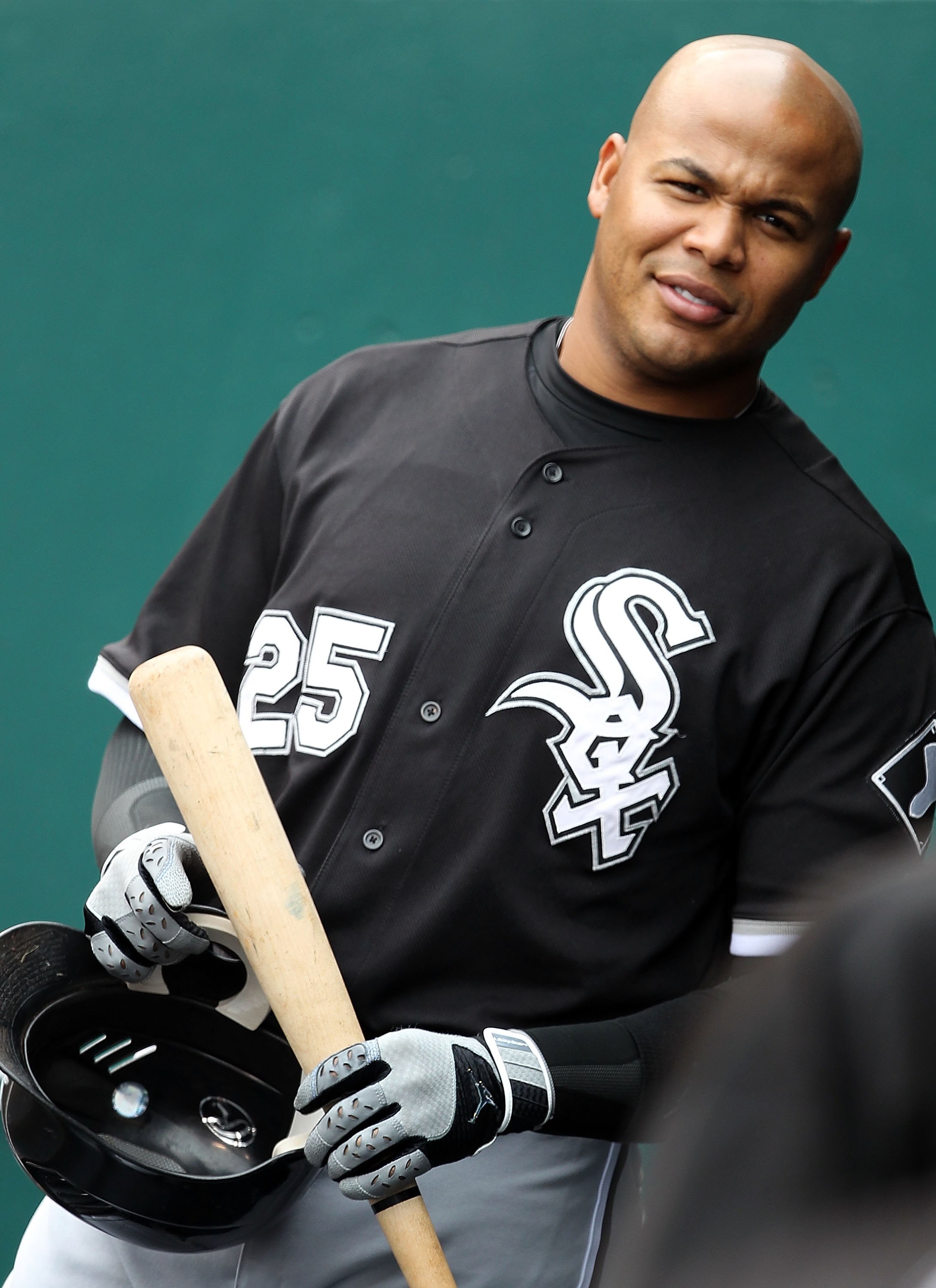 KANSAS CITY, MO - MAY 16:  Andruw Jones #25 of the Chicago White Sox talks to players in the dugout prior to the start of the game against the Kansas City Royals on May 16, 2010 at Kauffman Stadium in Kansas City, Missouri.  (Photo by Jamie Squire/Getty I